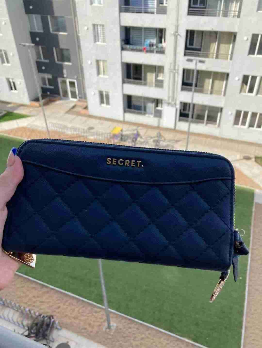 Billetera azul Secret