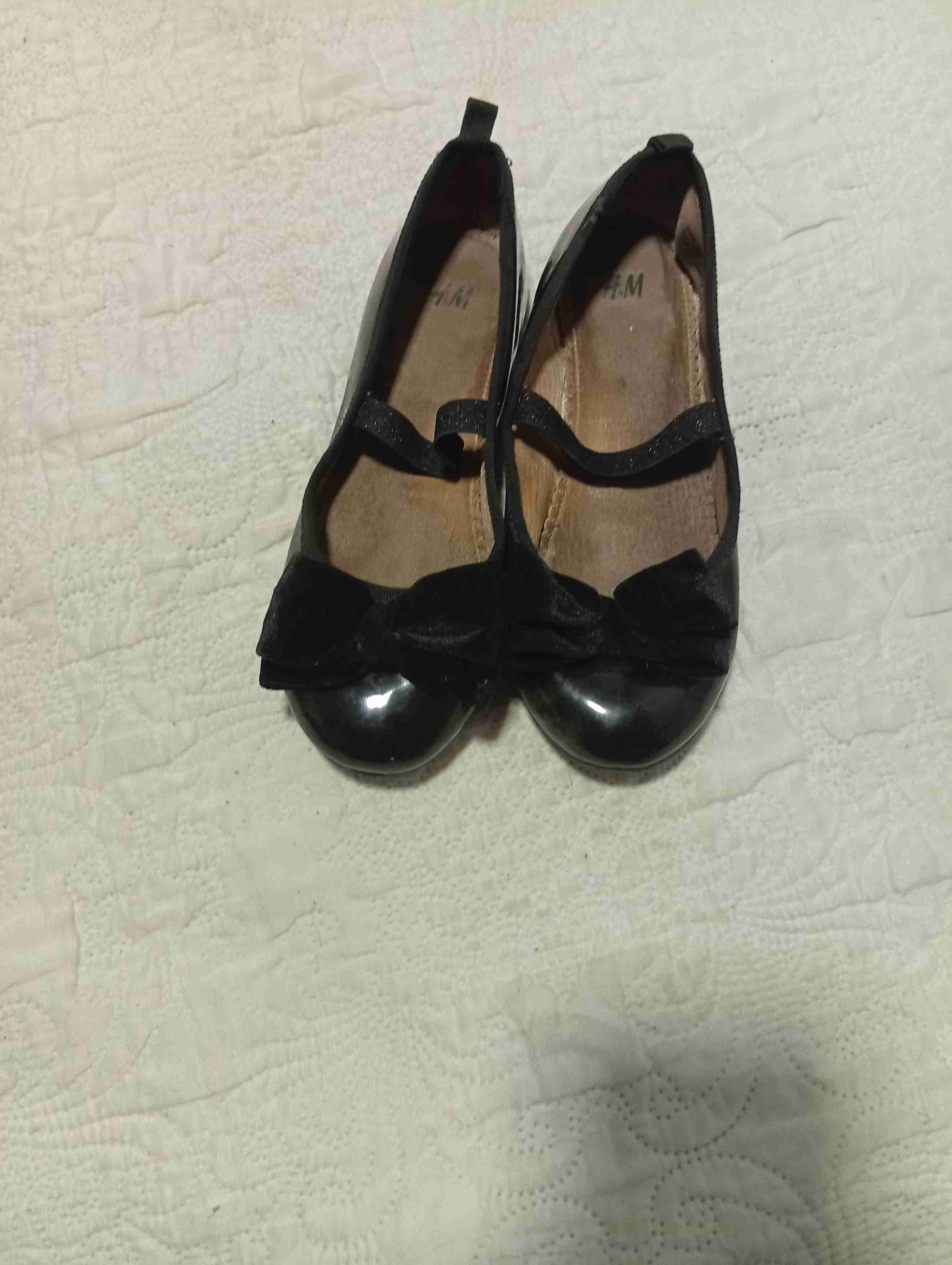 Zapatos planos negros con lazo