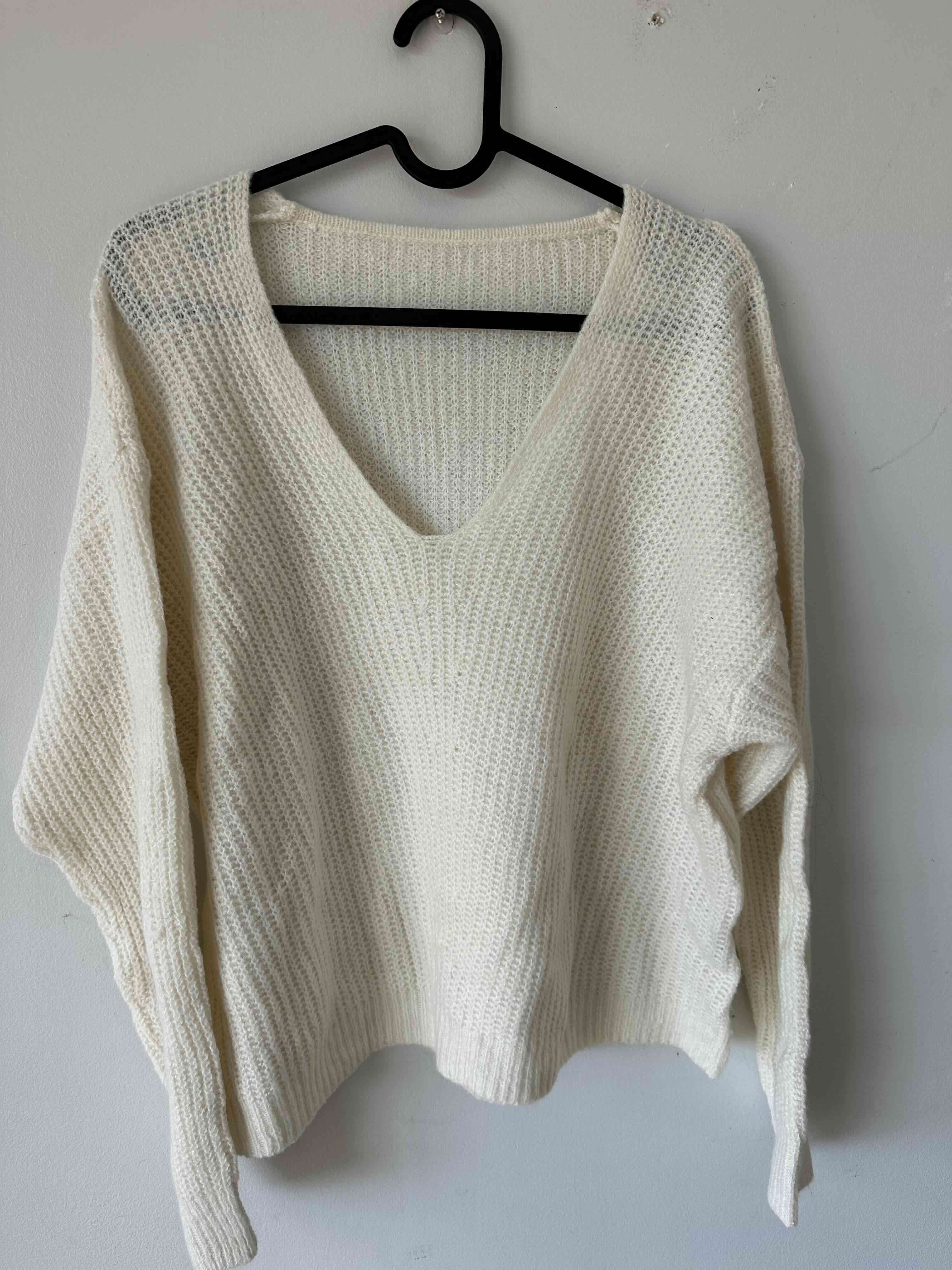 Suéter tejido blanco escote V