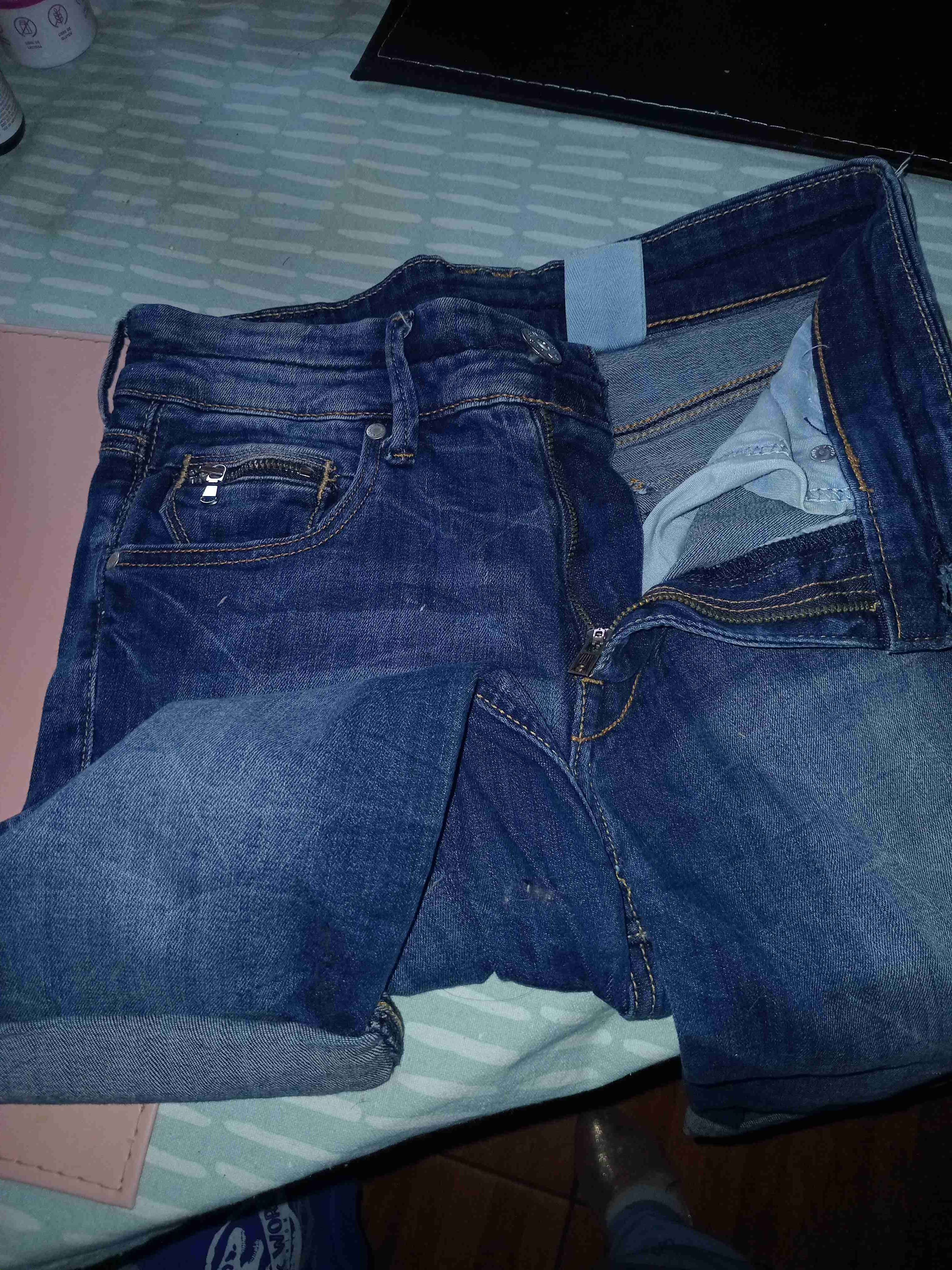 Jeans azul oscuro doblados - miniatura 5