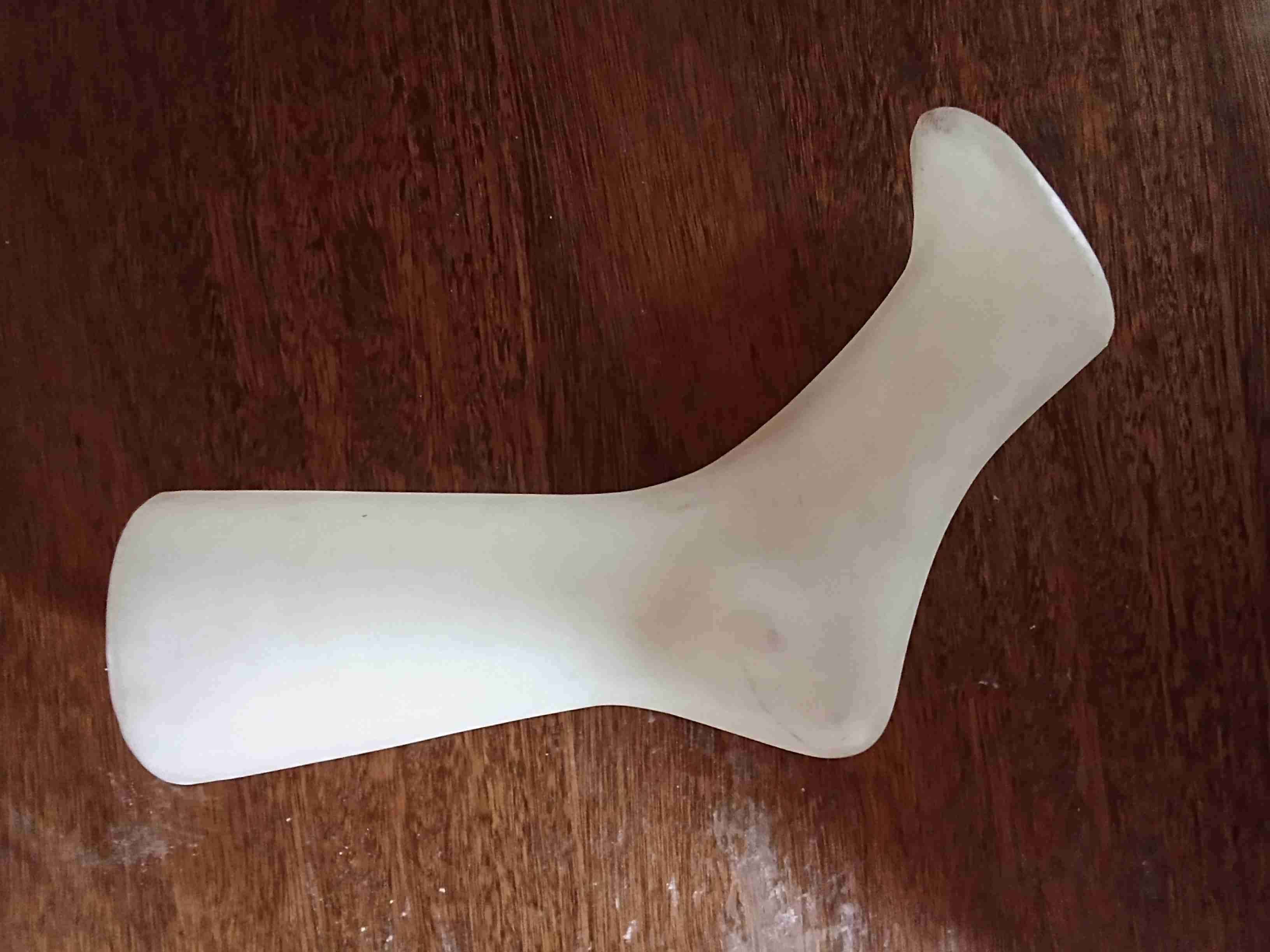 Alzador de zapatos de plástico blanco