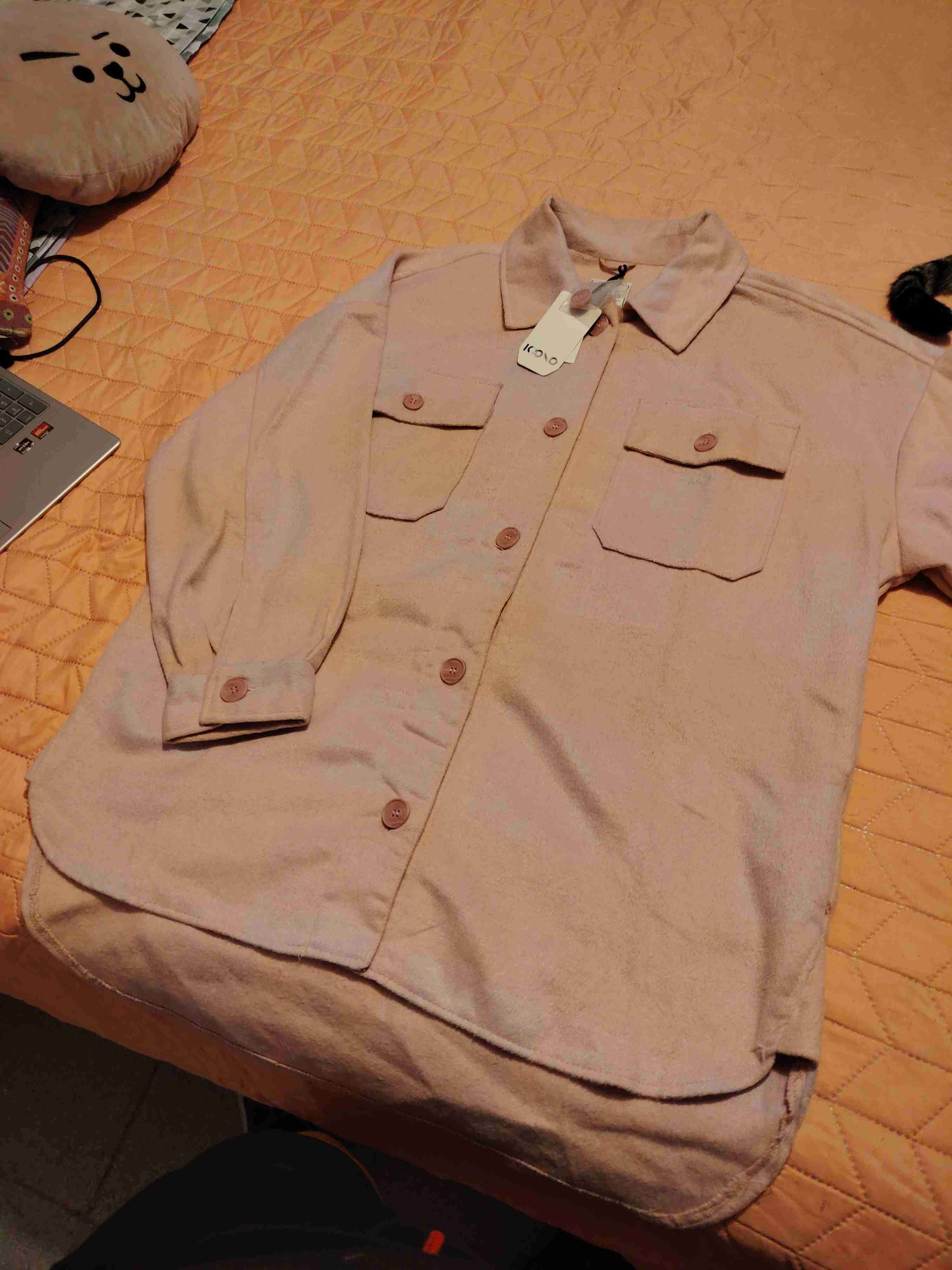 Chaqueta oversize rosada con bolsillos