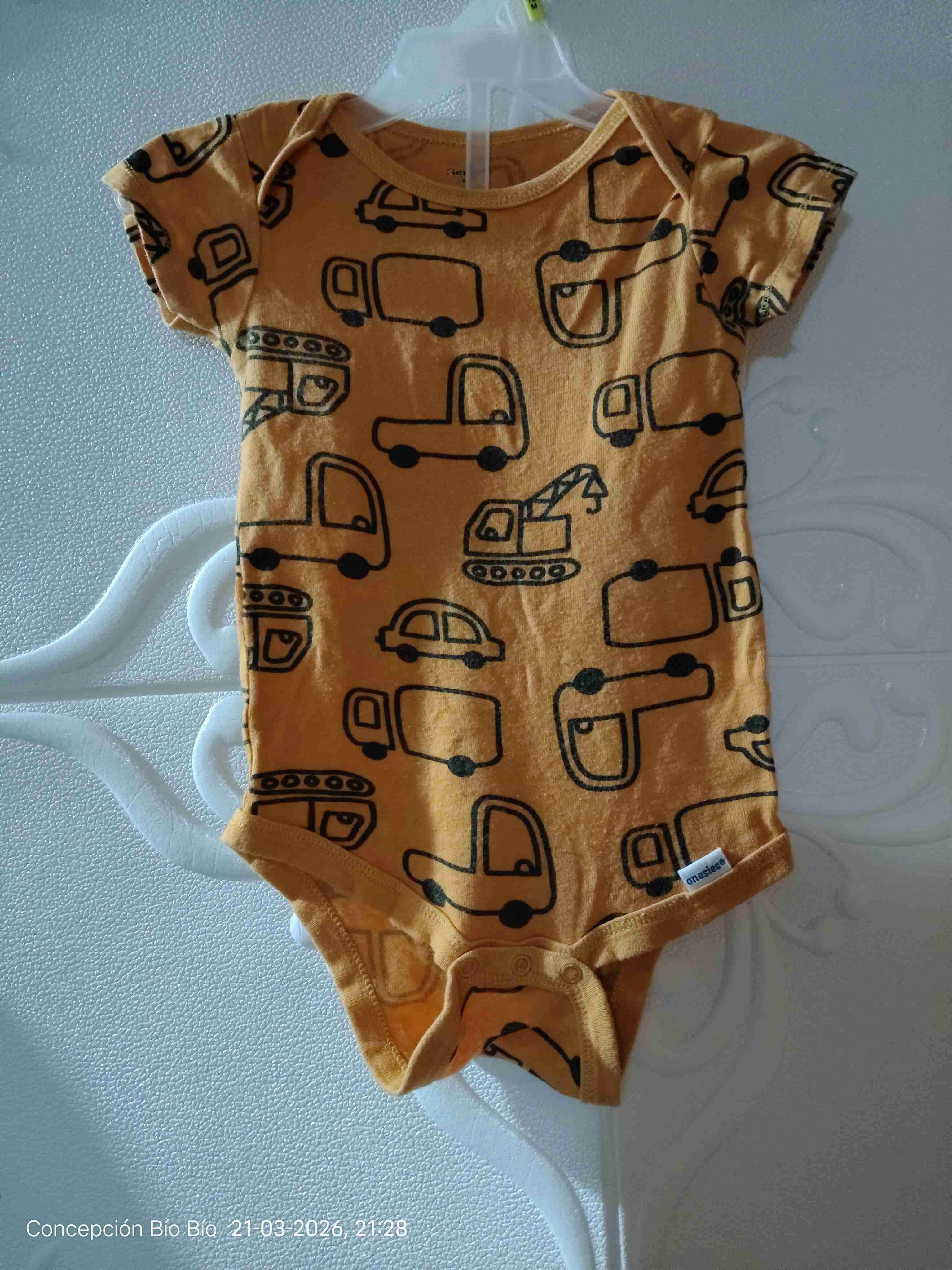 Body infantil amarillo con estampado