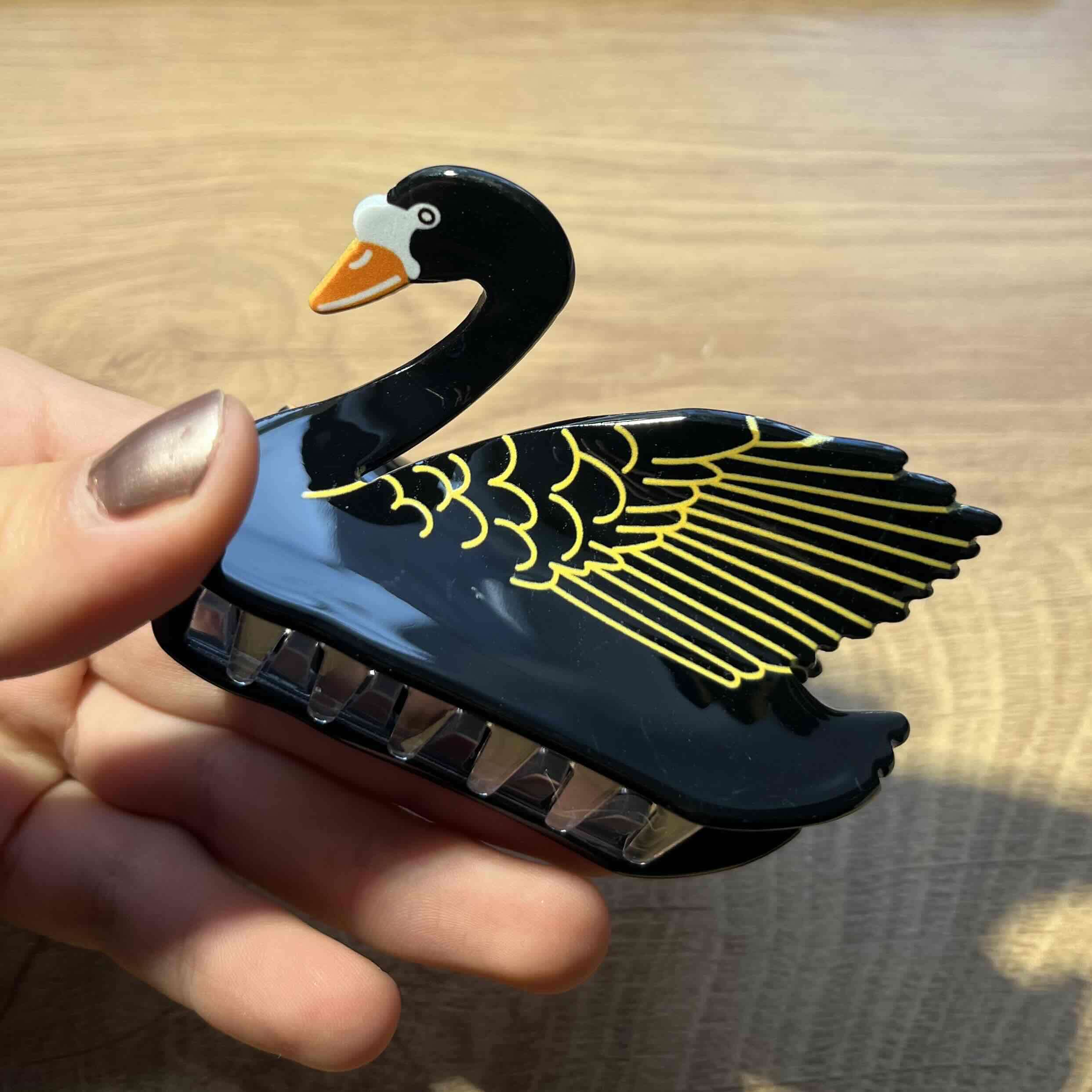 Pinza de pelo cisne negro