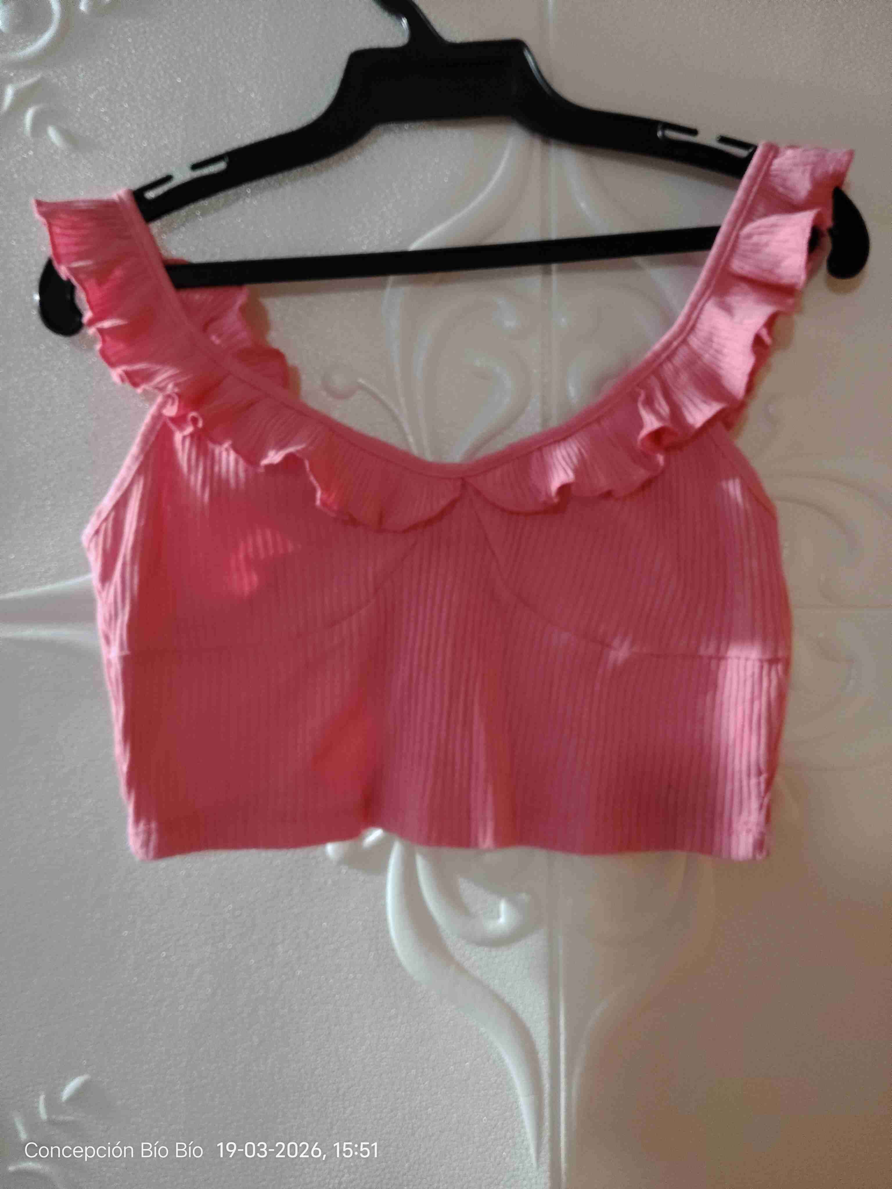 Top rosado con vuelos