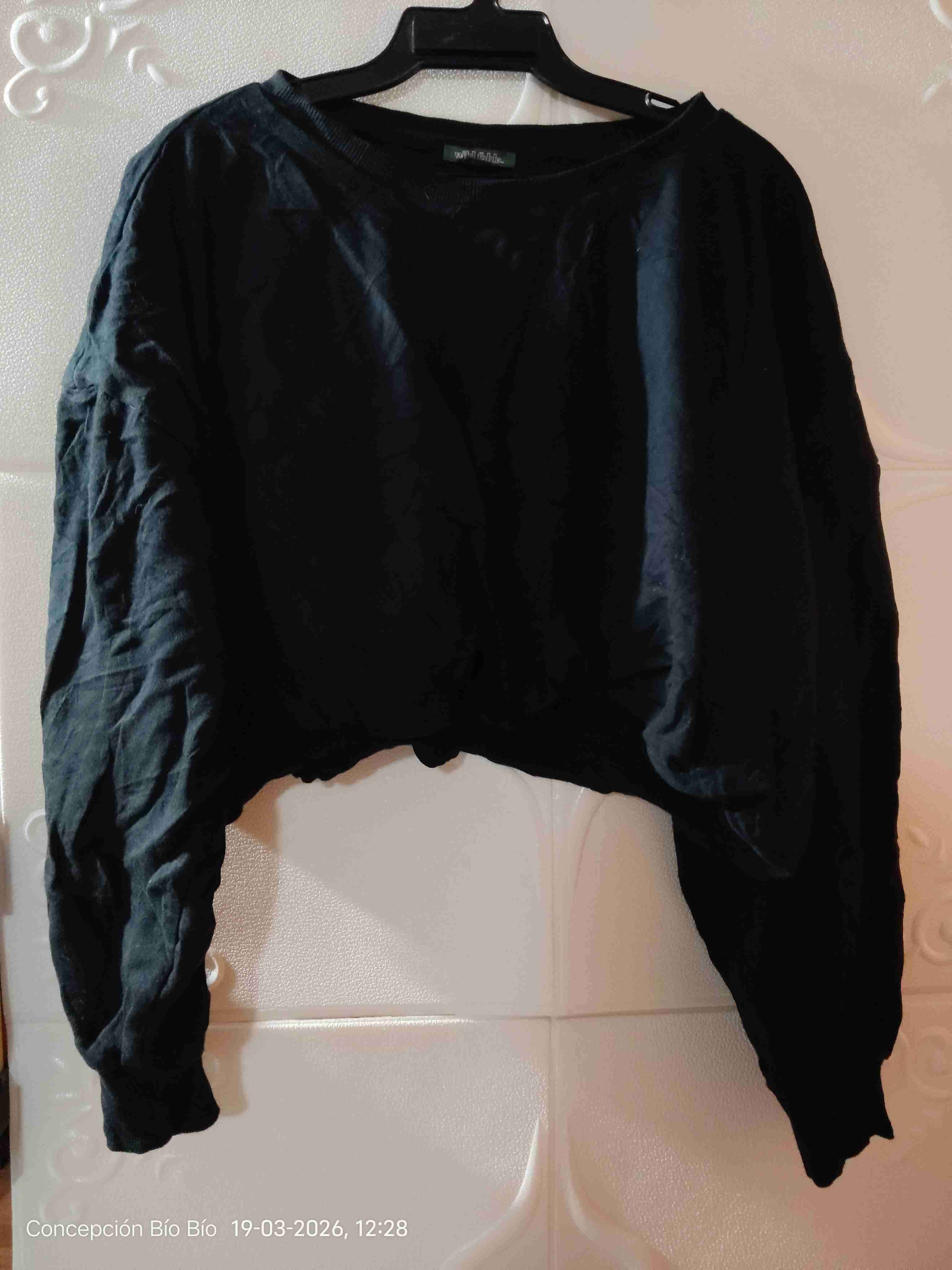 Suéter negro amplio