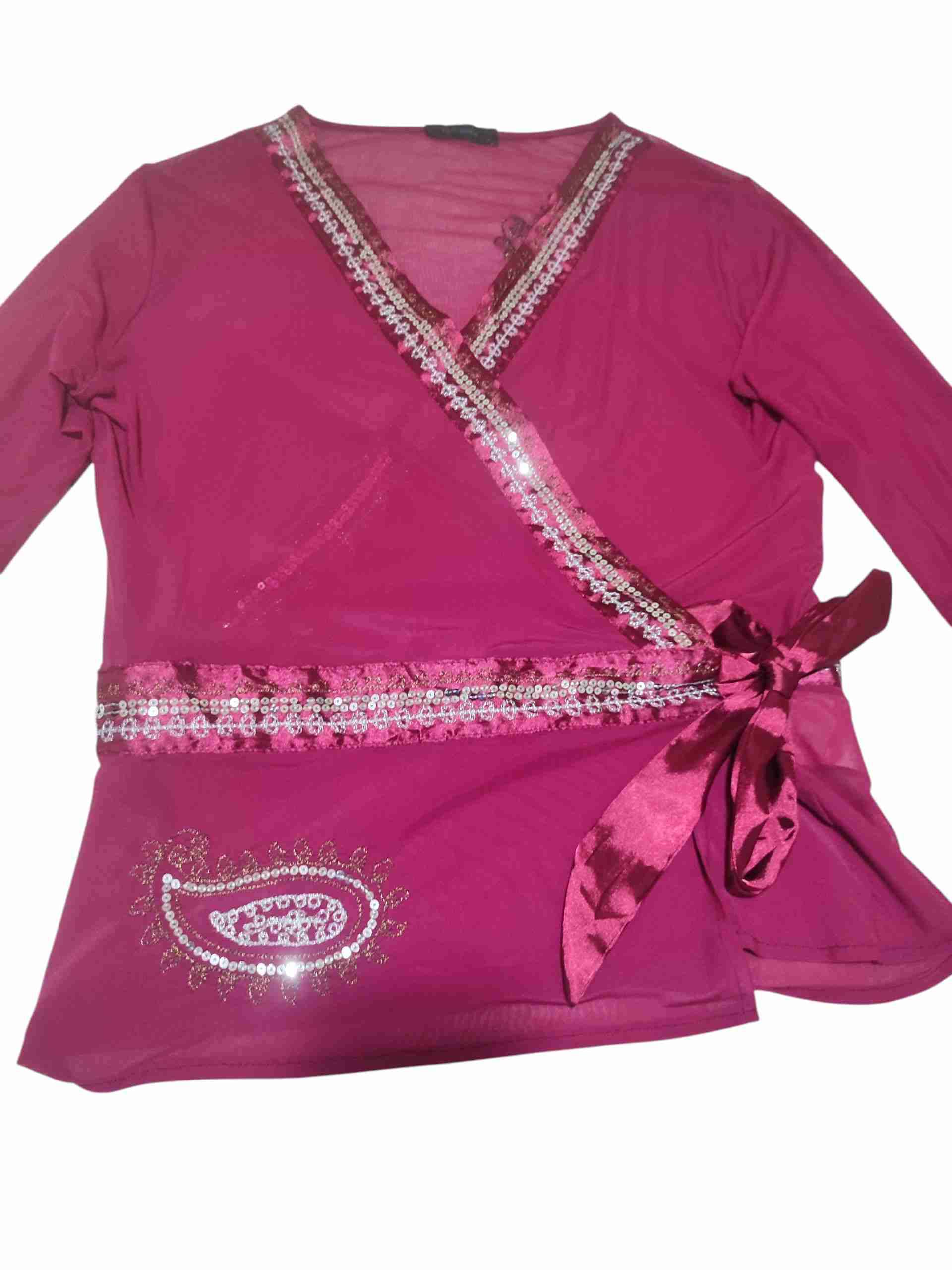 Blusa fucsia con lentejuelas