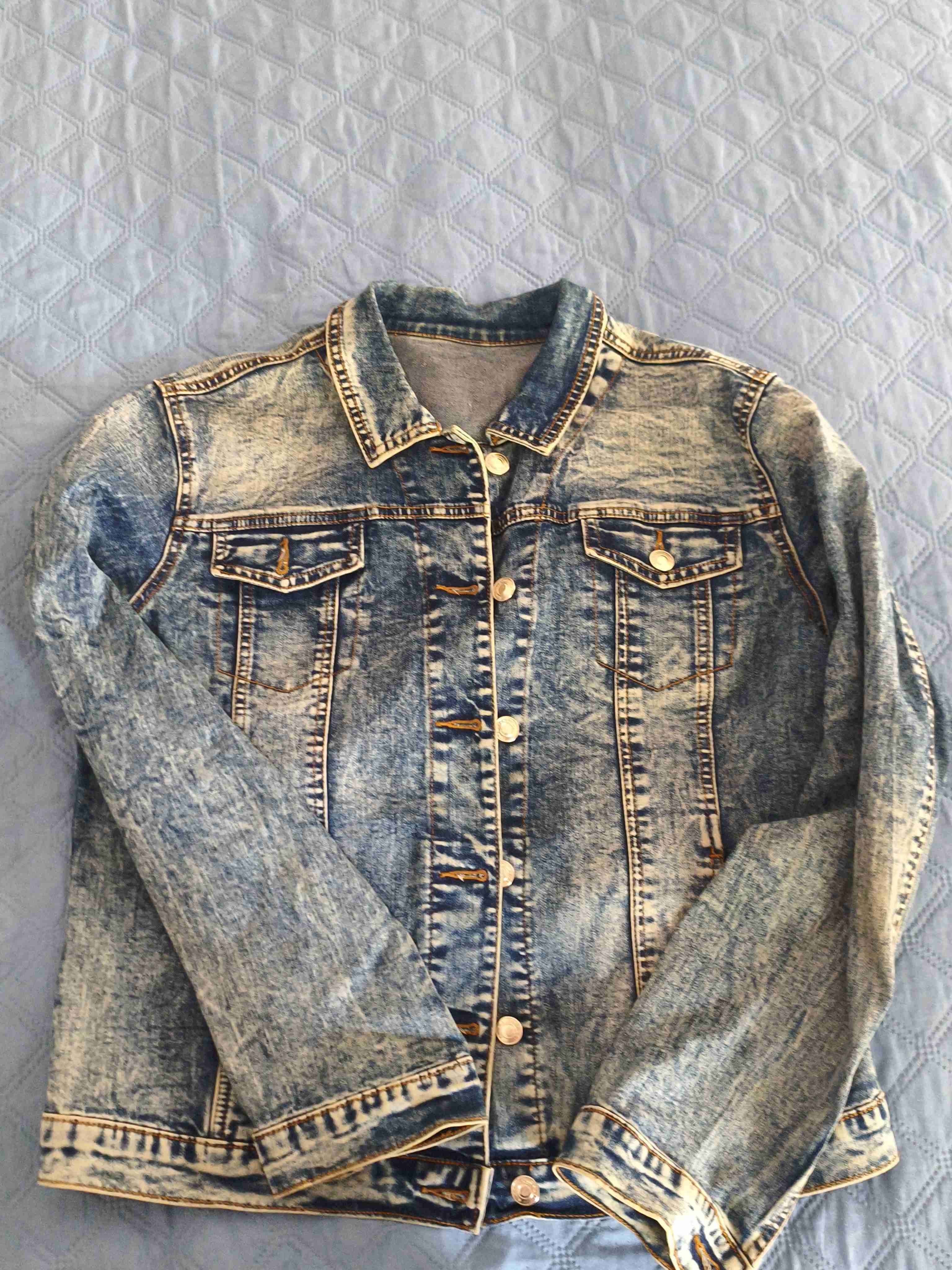 Chaqueta de mezclilla desgastada