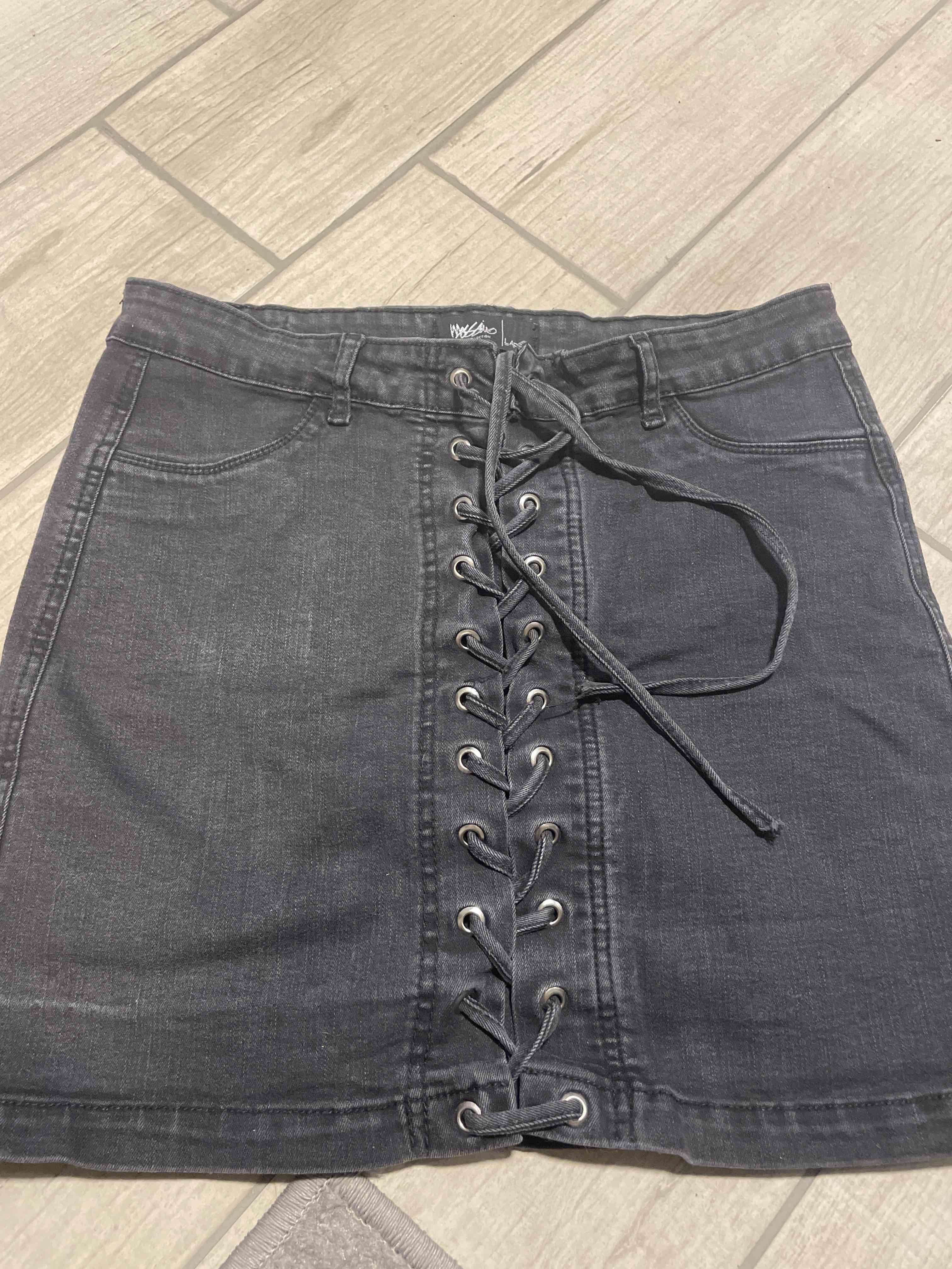 Falda denim negro jaspeado