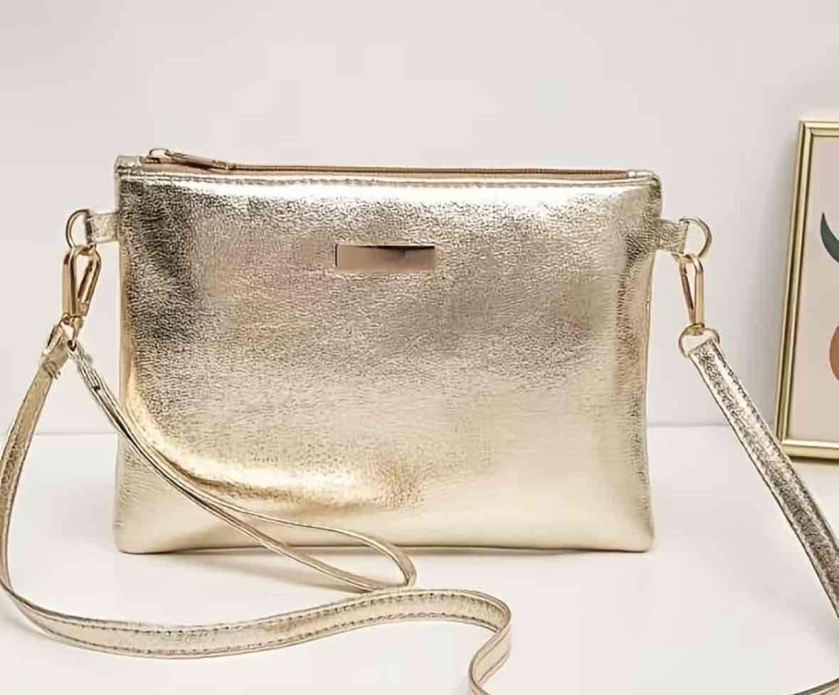 Cartera plateada y dorada de mano - miniatura 2