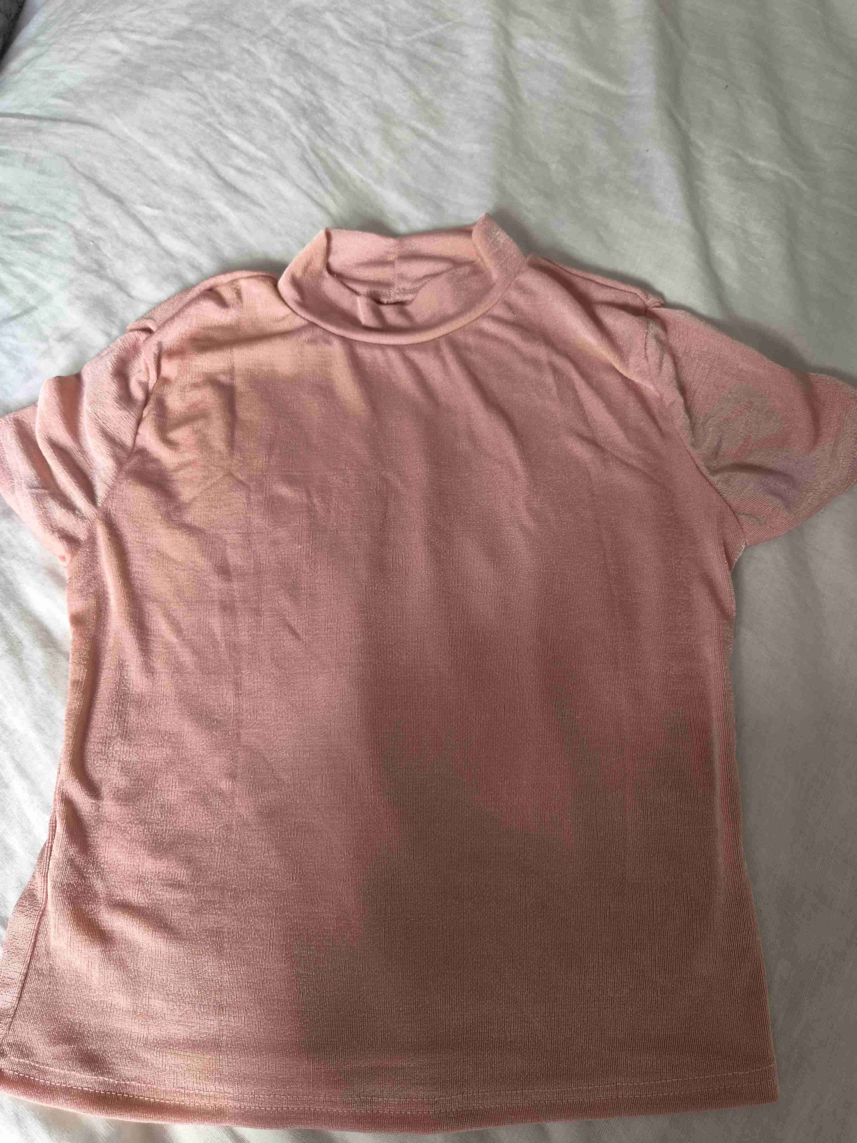 Polera rosada cuello alto