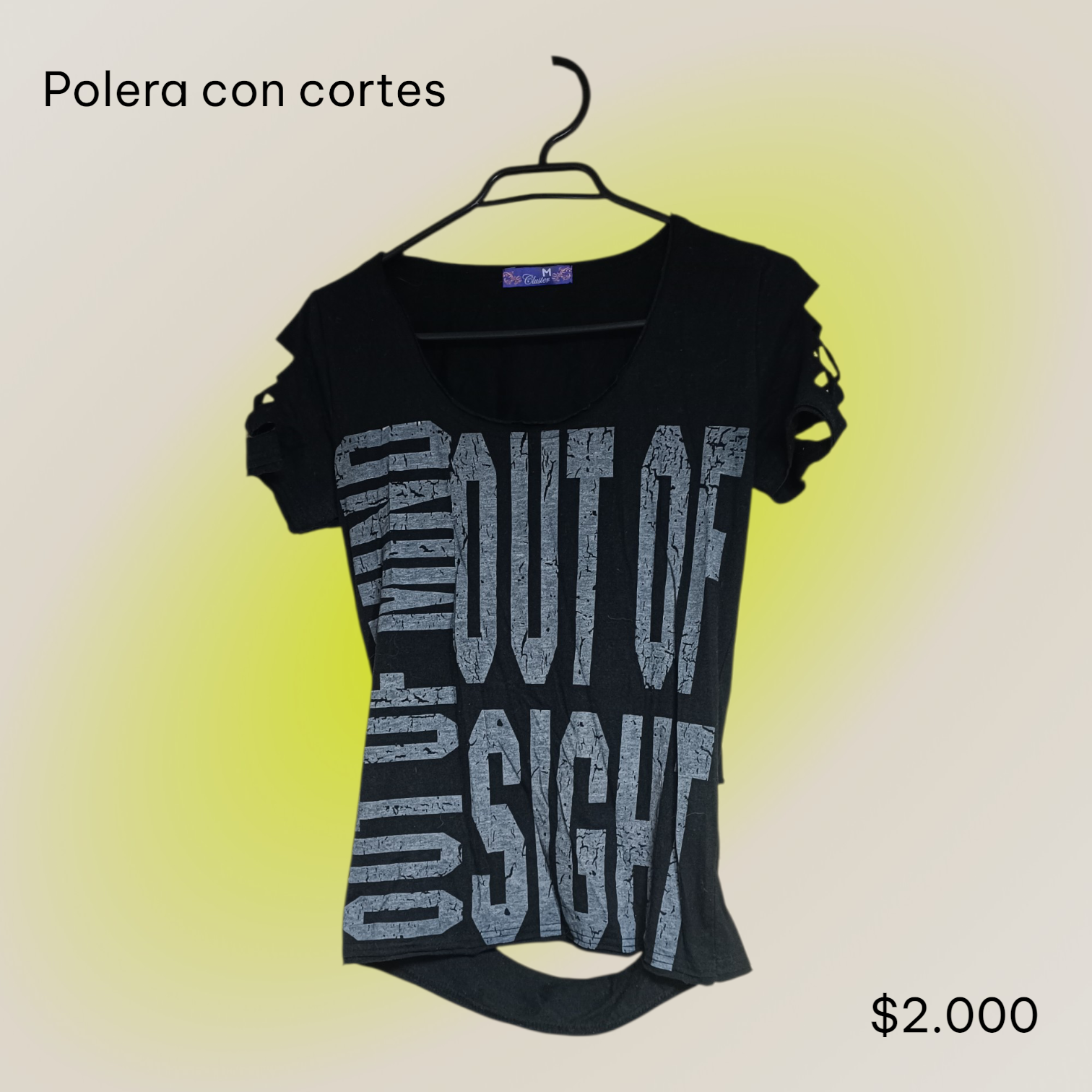 Polera negra con cortes