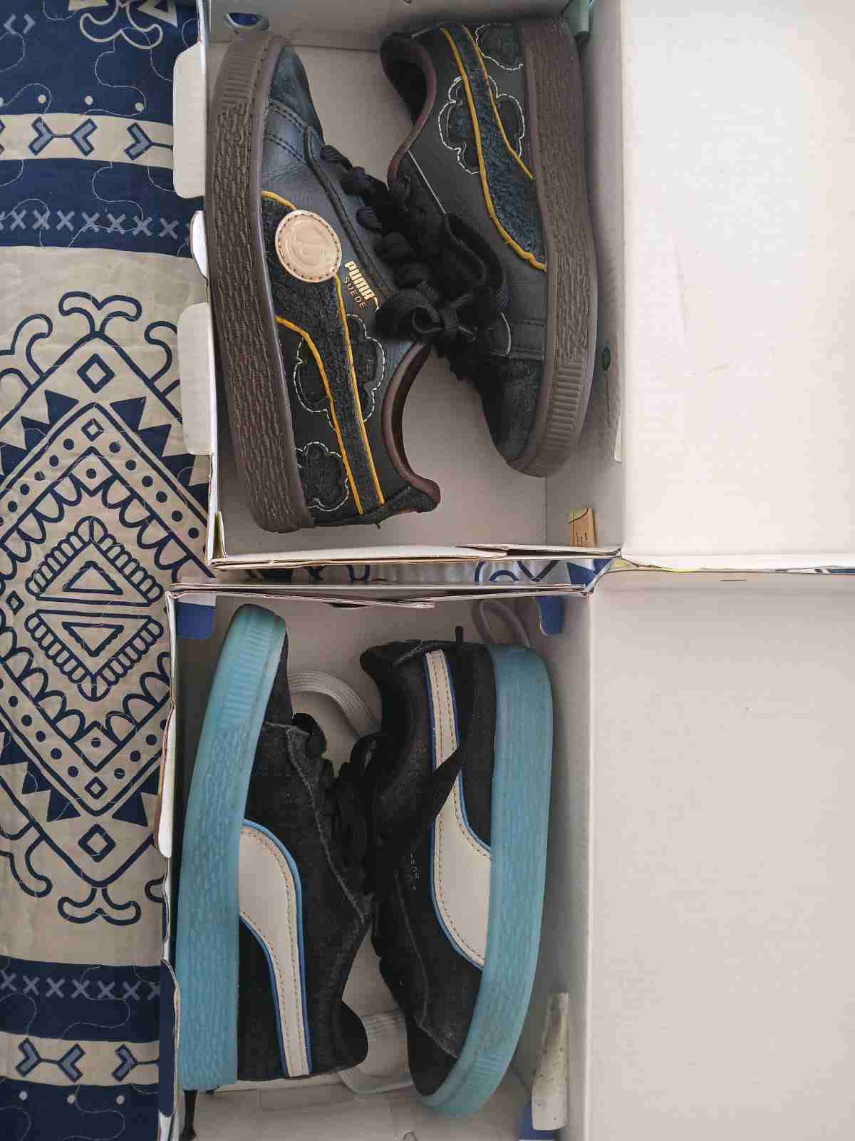 Zapatillas negras niño PUMA en caja