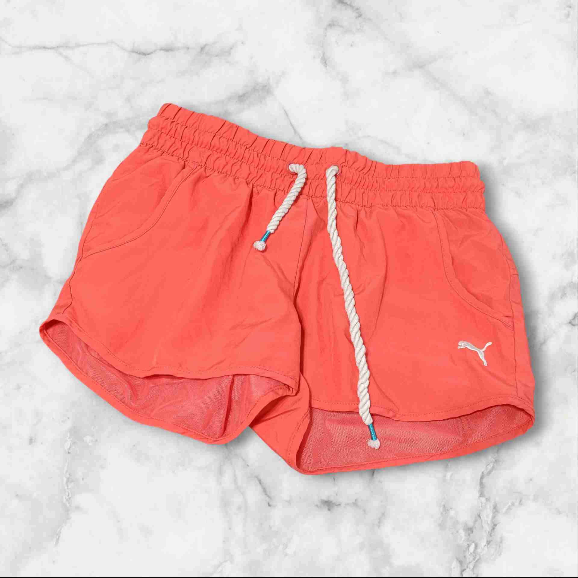 Shorts deportivos coral