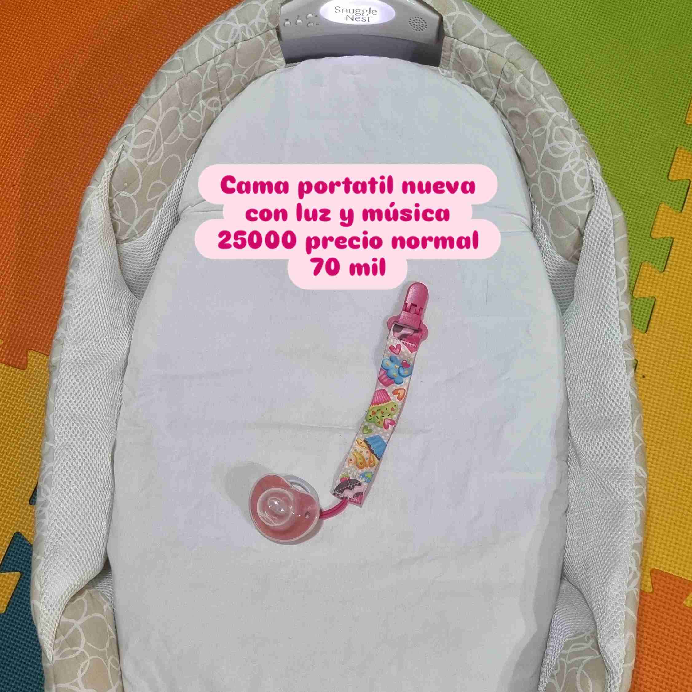 Cama portátil con luz y música