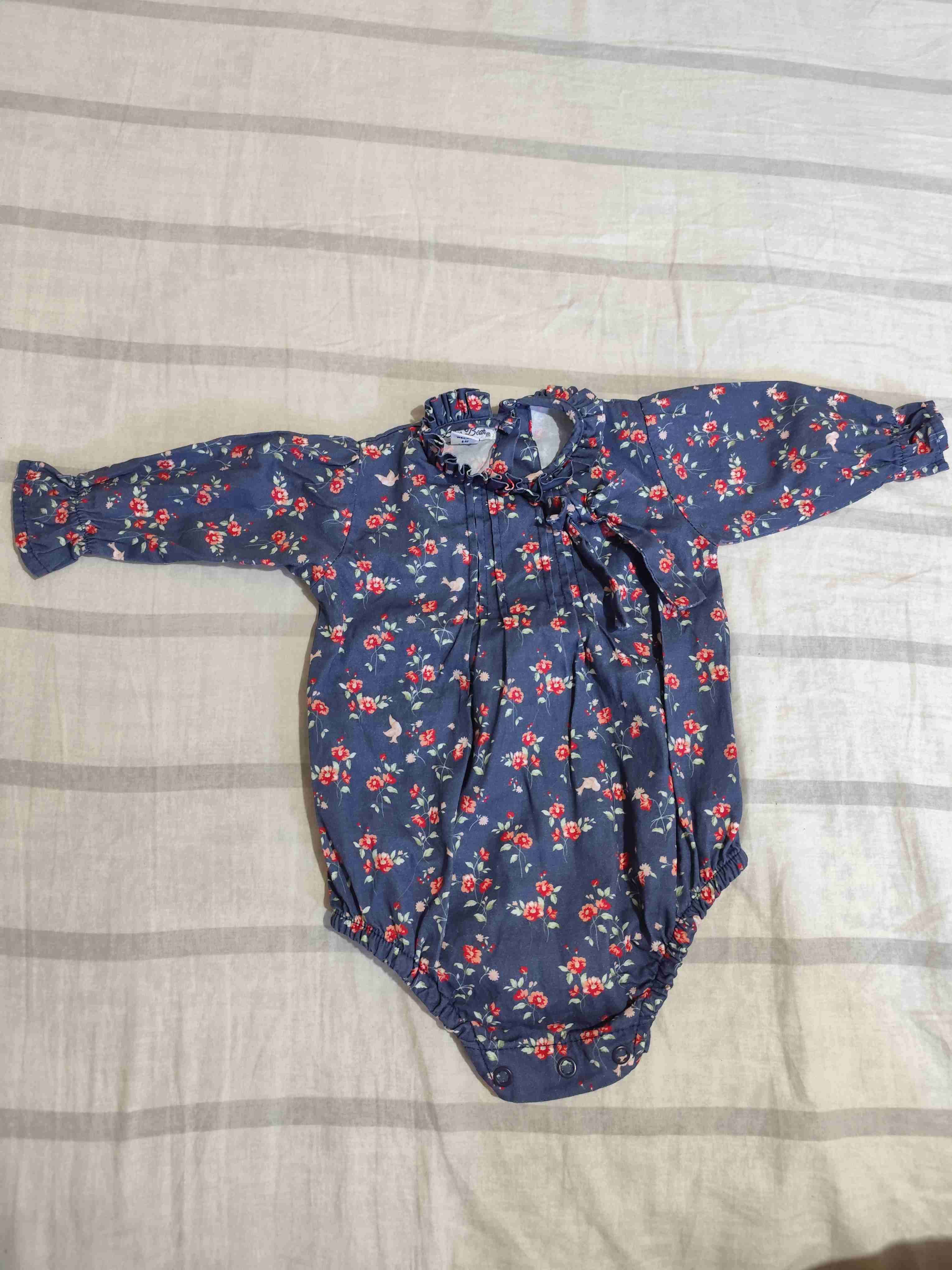 Body de bebé con flores