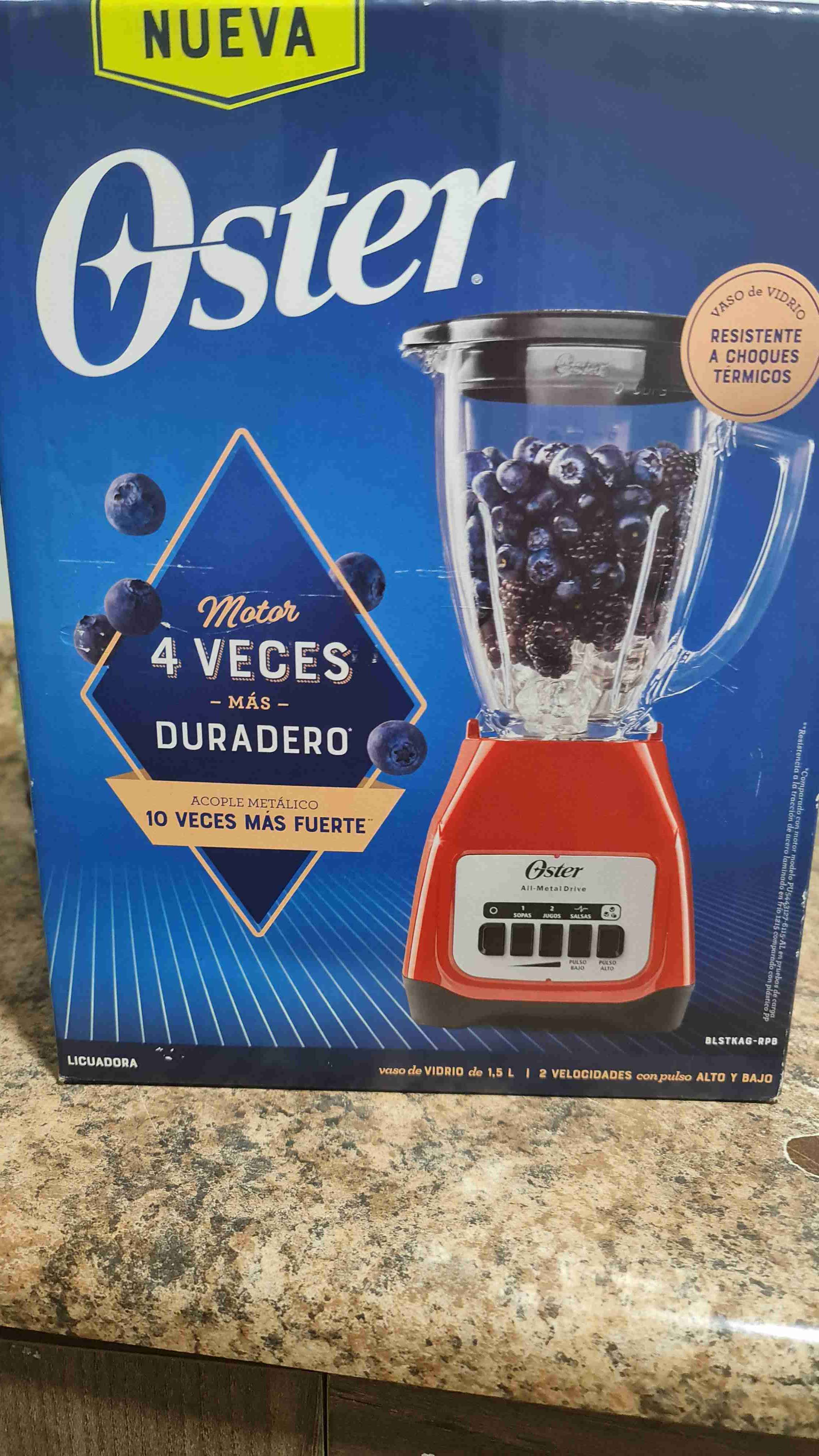 Licuadora Oster roja nueva