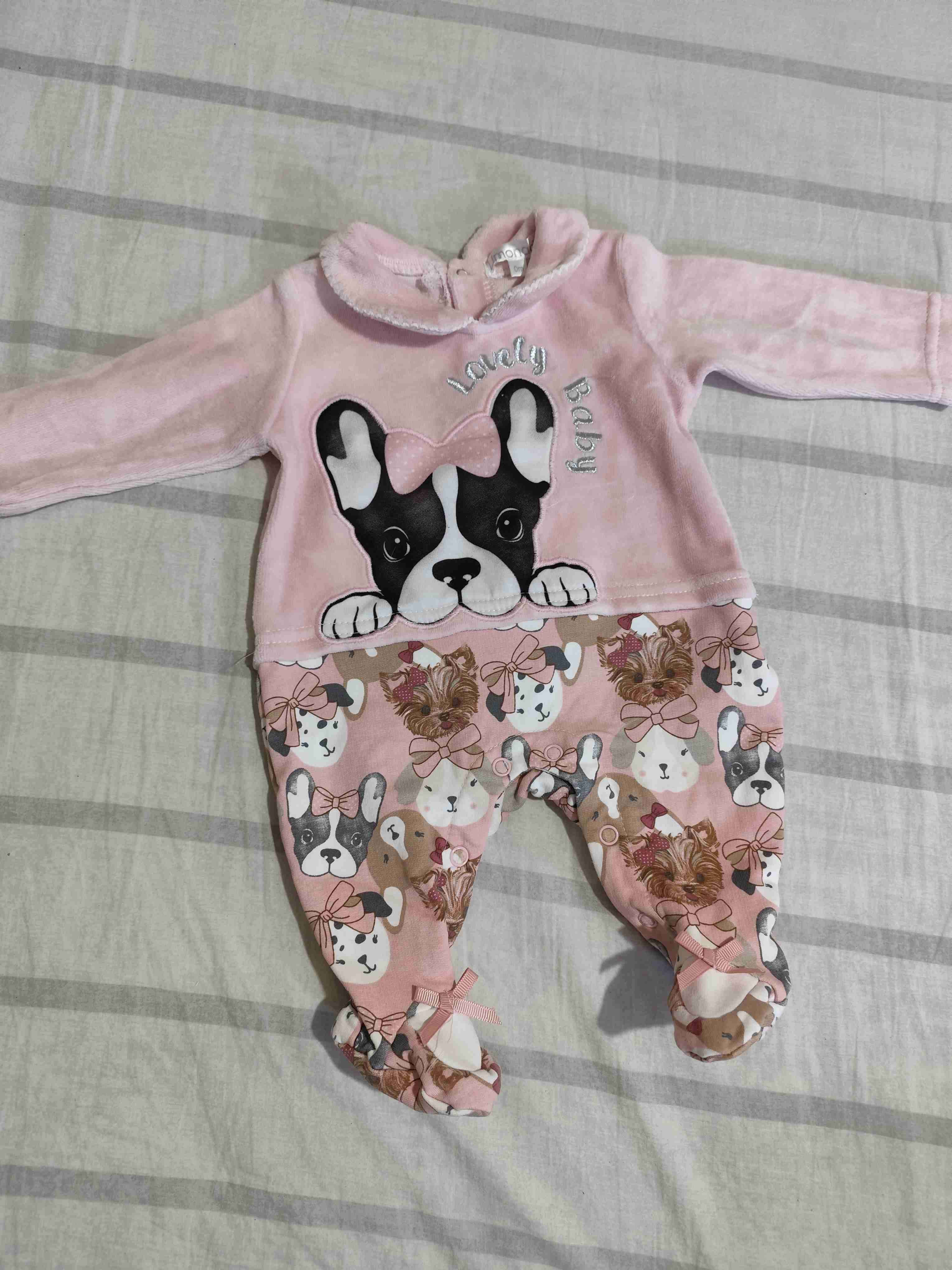 Pijama bebé rosado con perritos