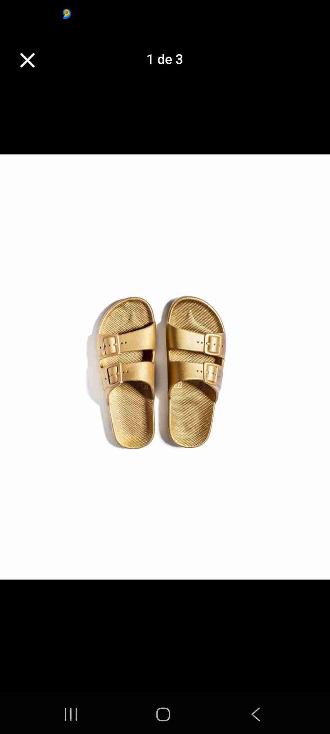 Sandalias doradas de dos tiras