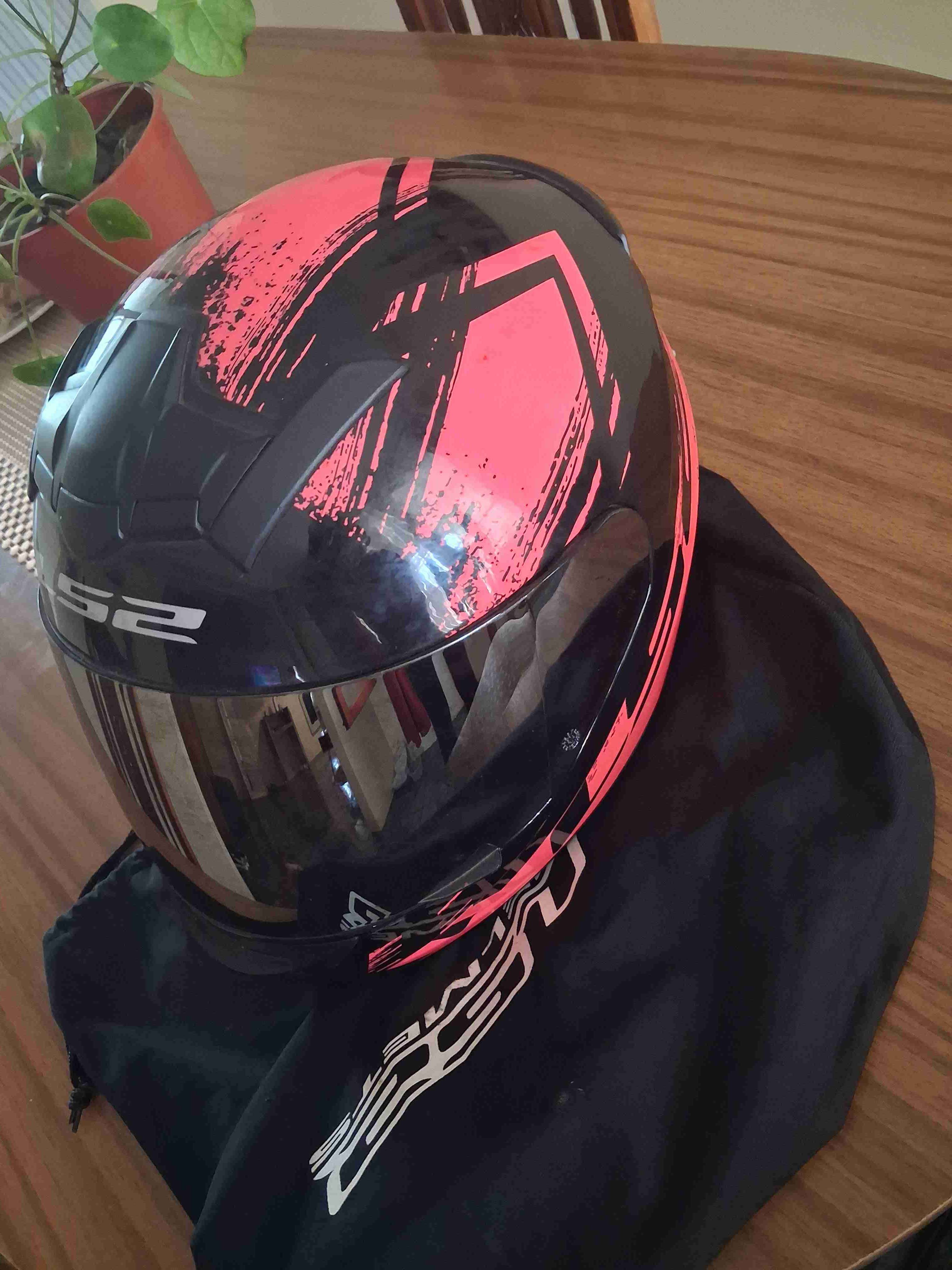 Casco de moto negro y fucsia talla M