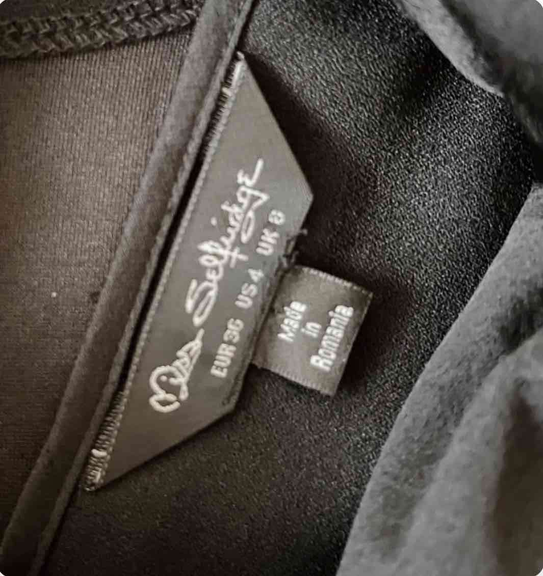 Vestido negro sin mangas elegante - miniatura 4