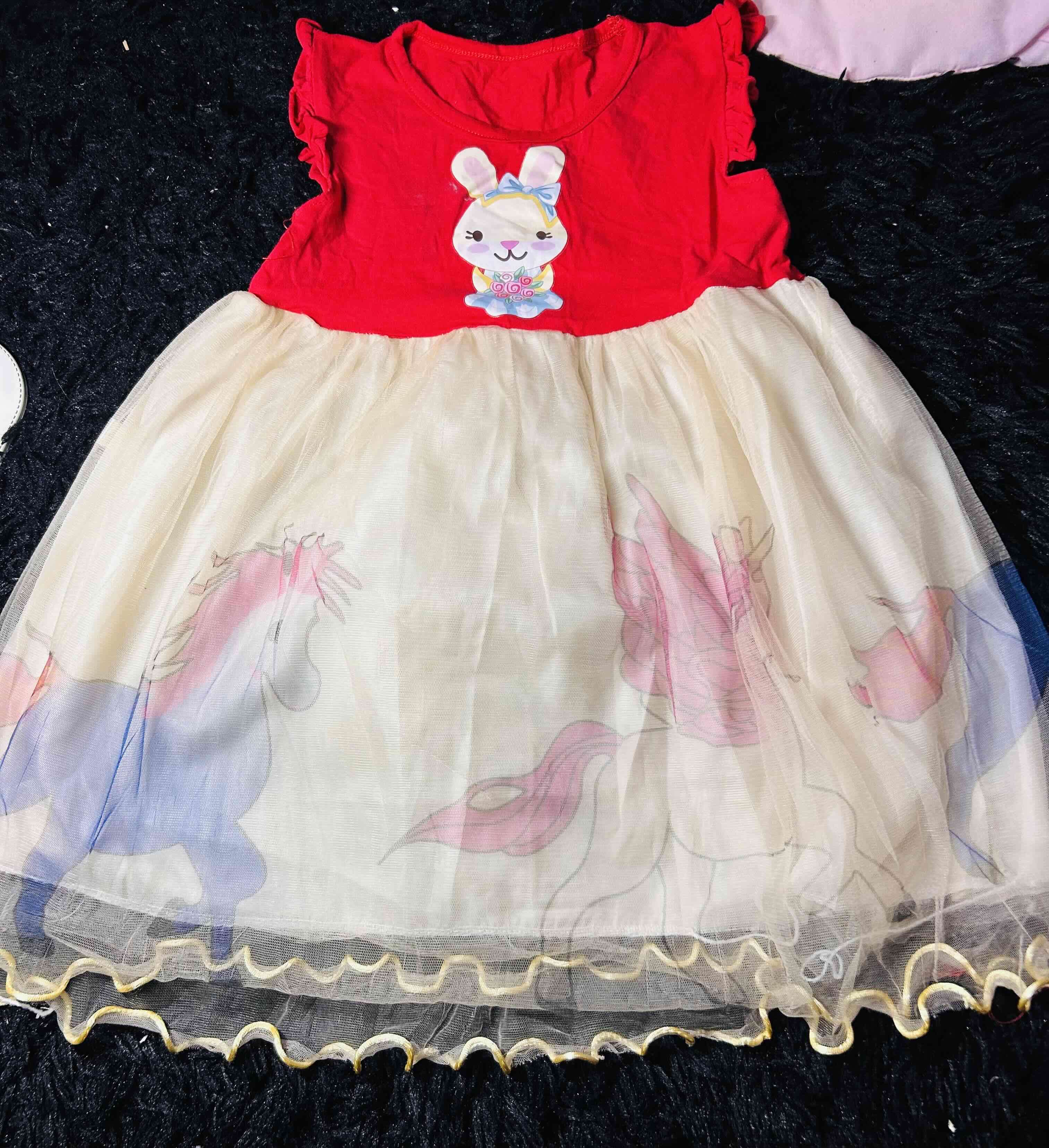 Vestido infantil rojo y unicornio
