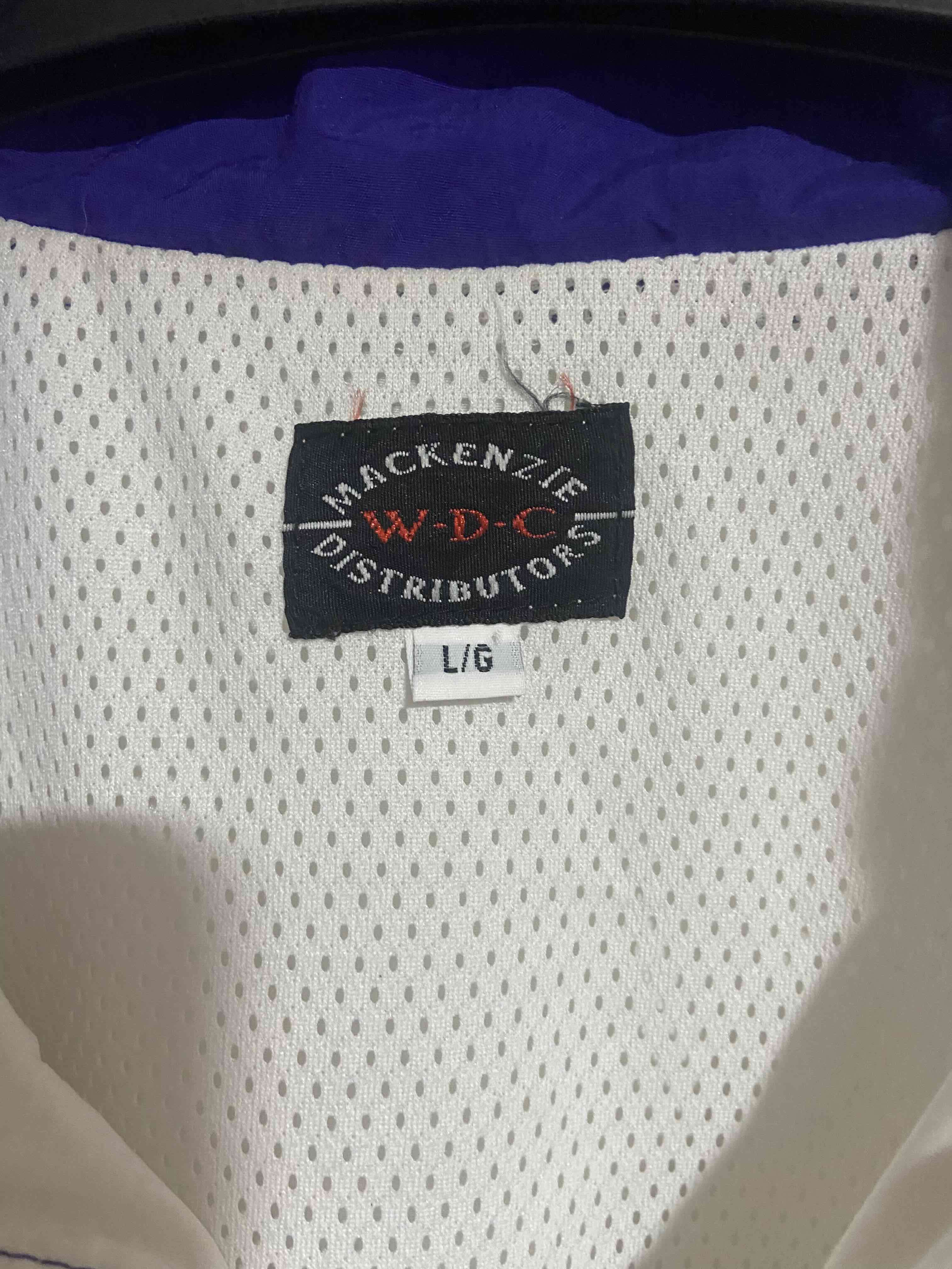 Chaqueta cortavientos blanca y amarilla - miniatura 3