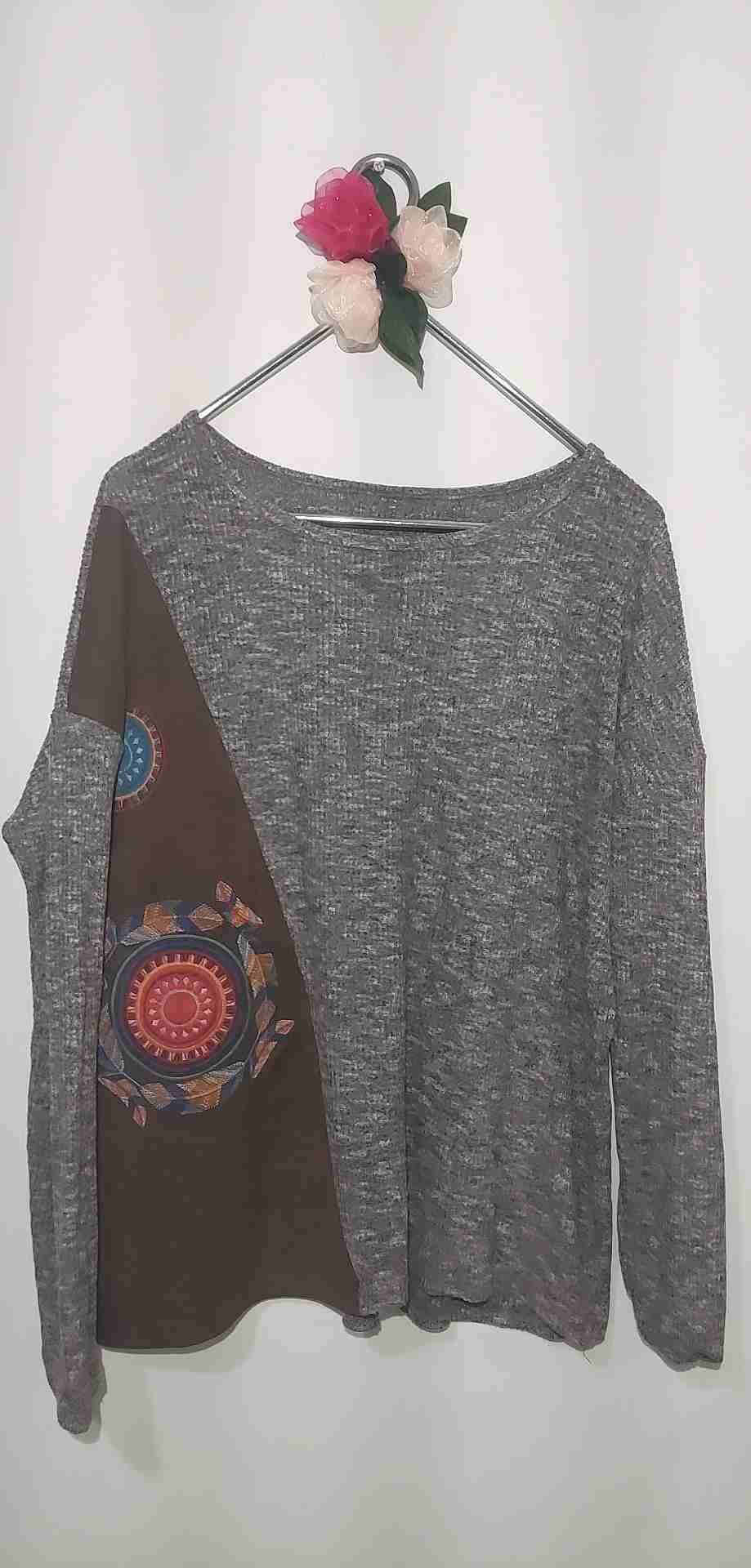 Sweater delgado jaspeado Marron.