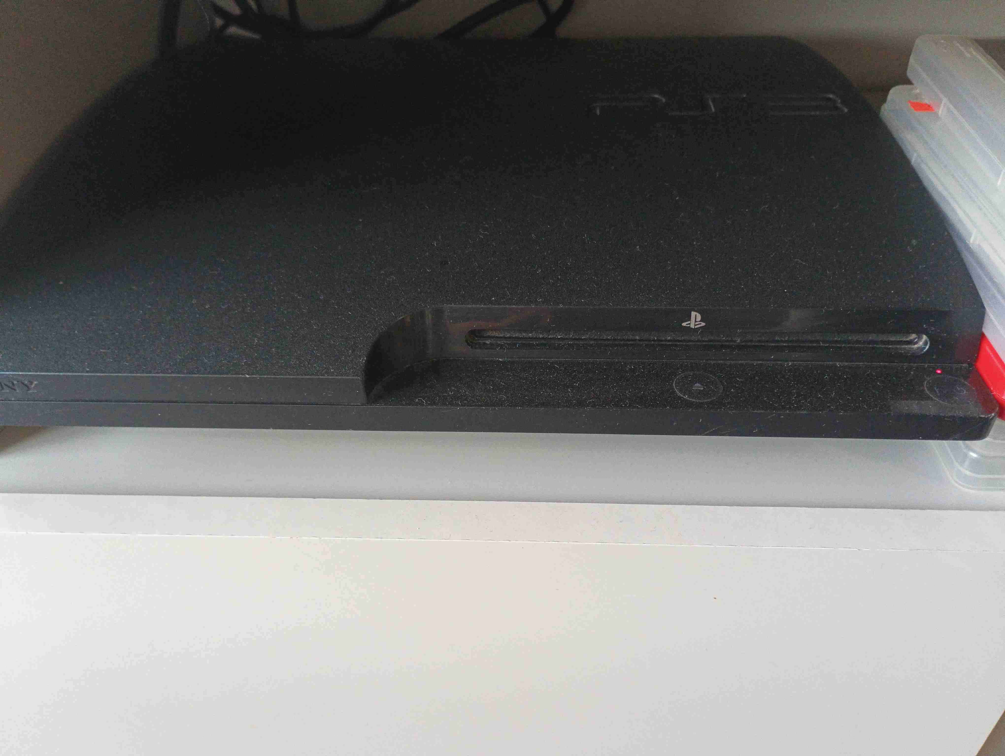 Consola PS3 con controles y juegos - miniatura 2