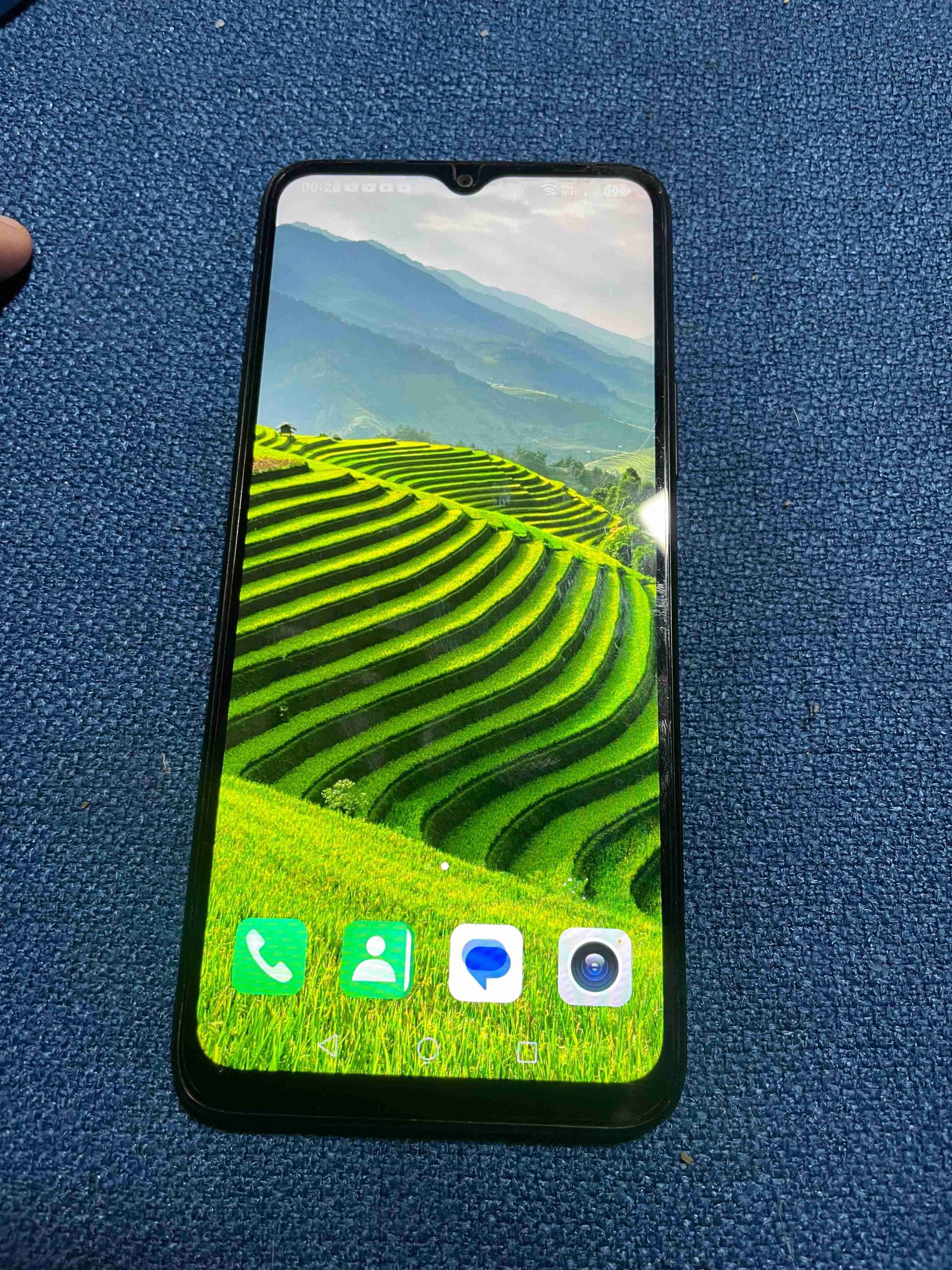 Celular negro con caja - miniatura 2