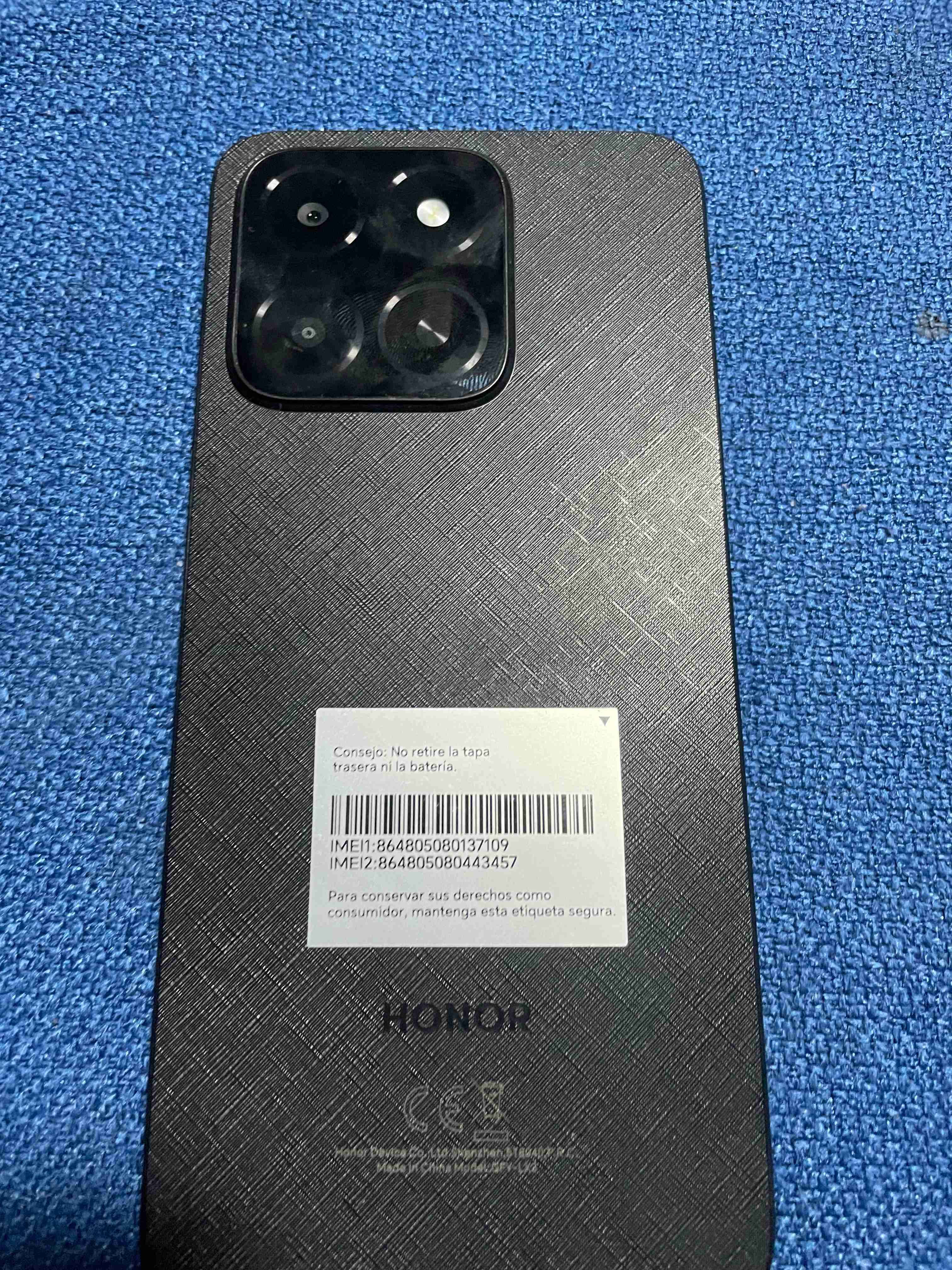 Celular negro con caja - miniatura 5