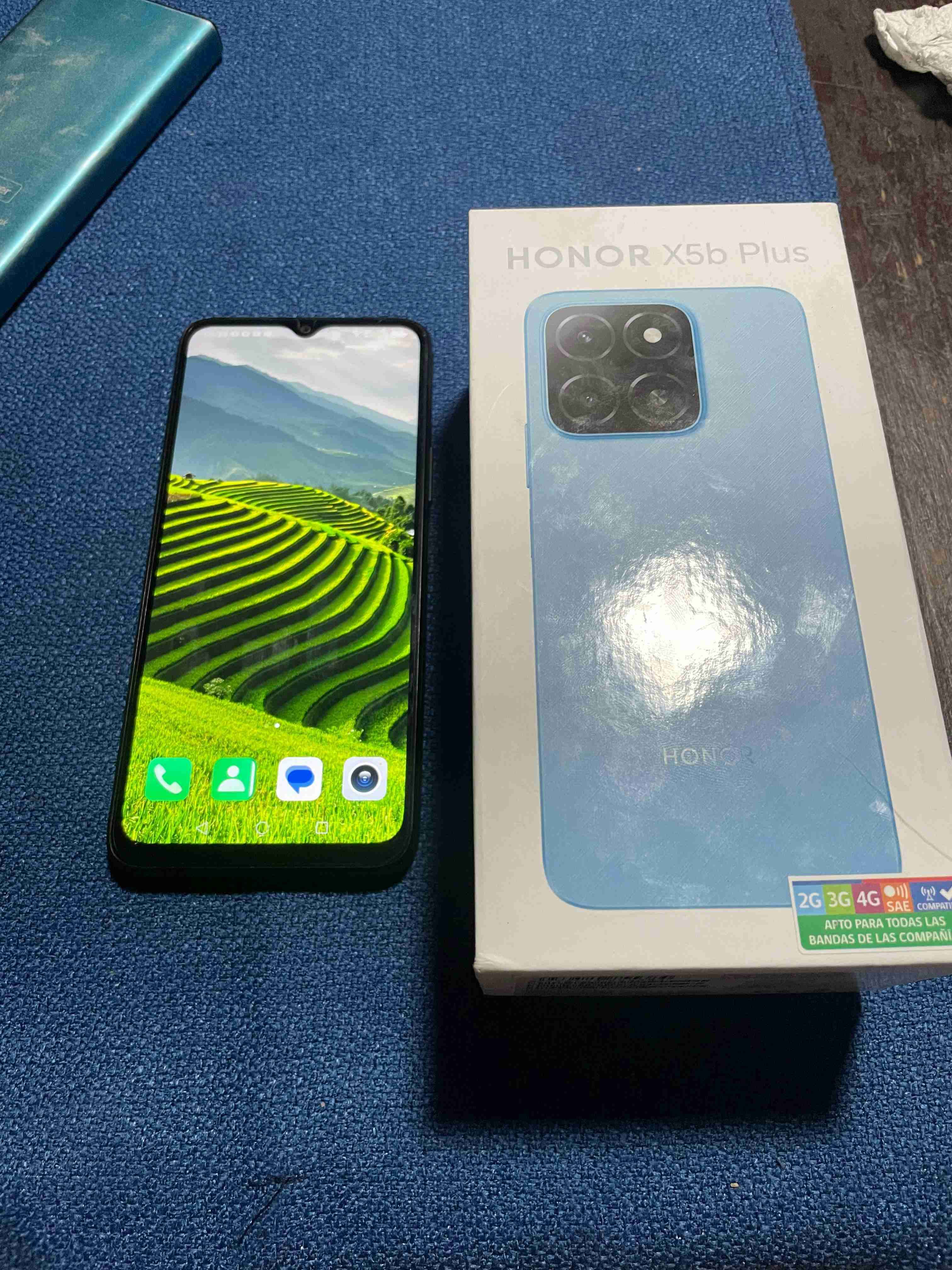 Celular negro con caja - miniatura 6