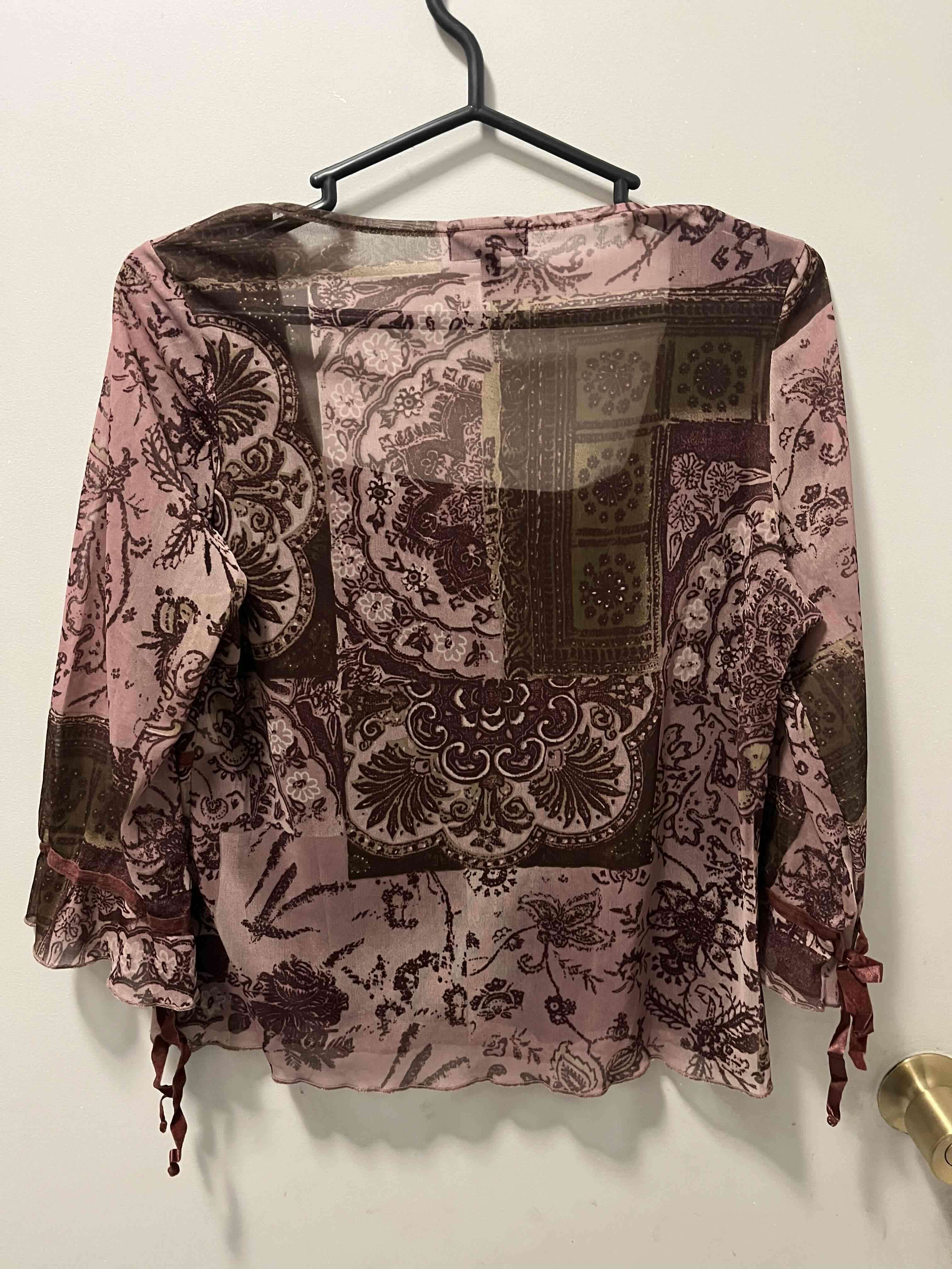 Blusa estampada manga larga