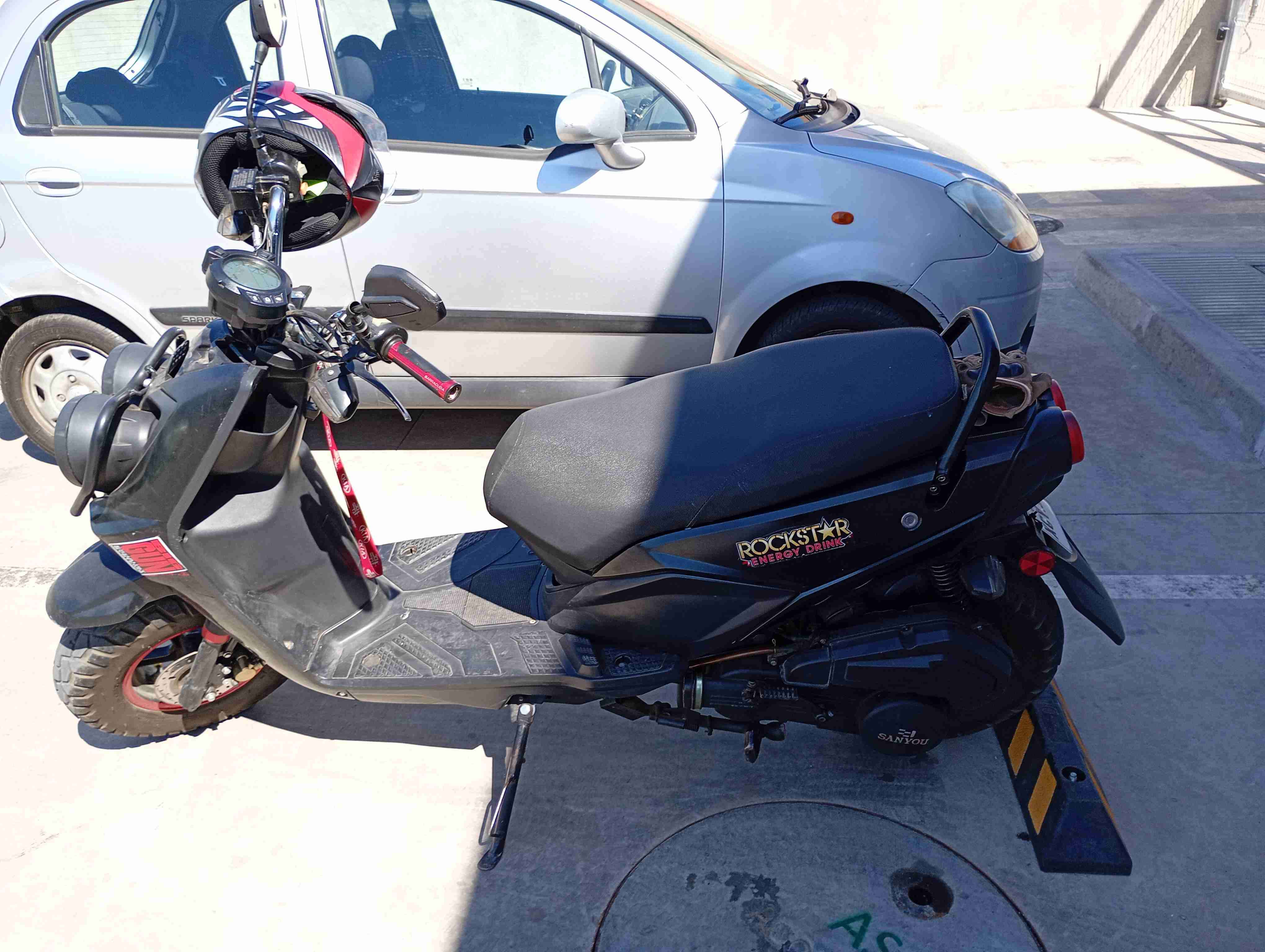 Scooter negra económica