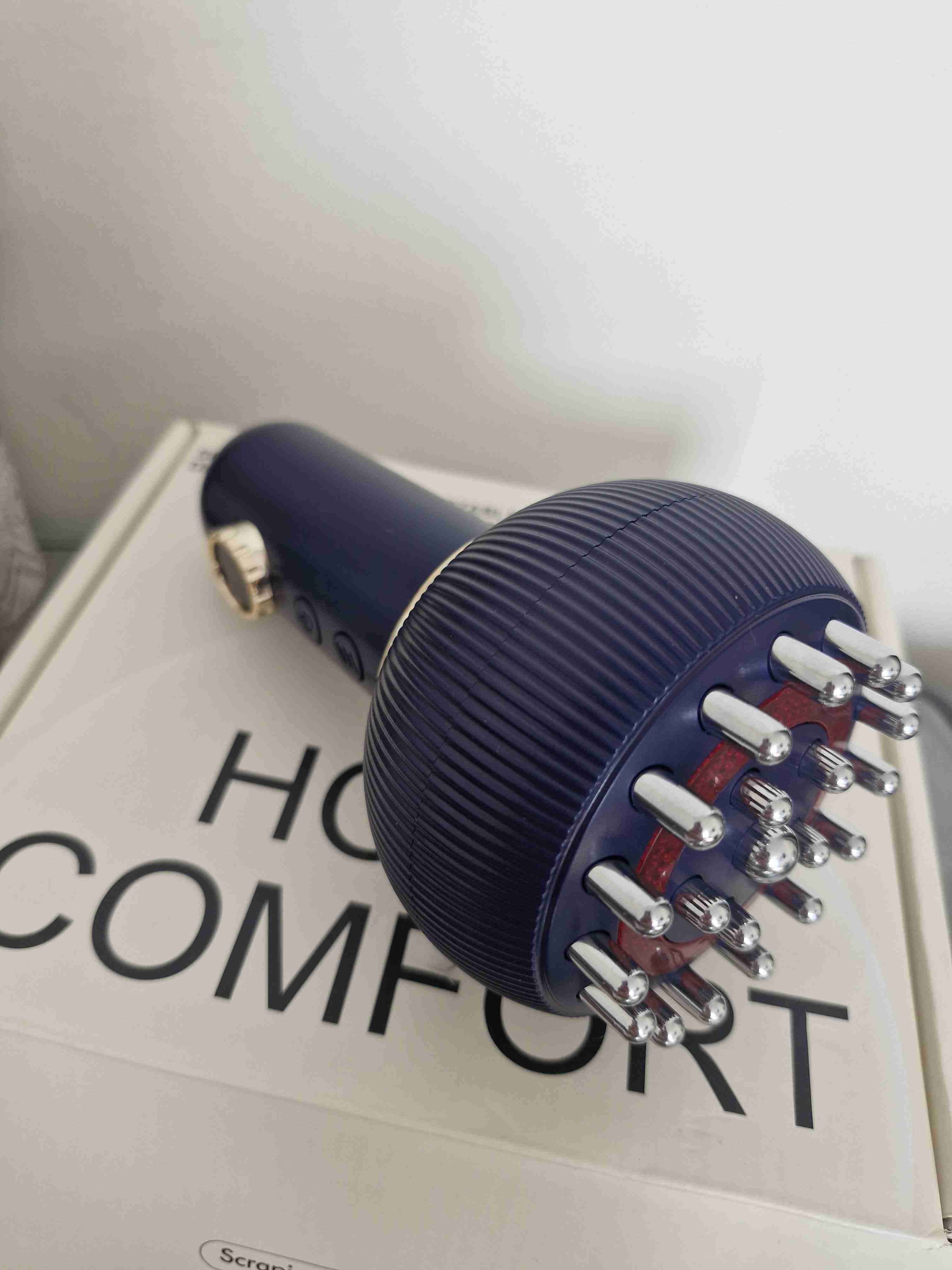 Cepillo masajeador eléctrico azul