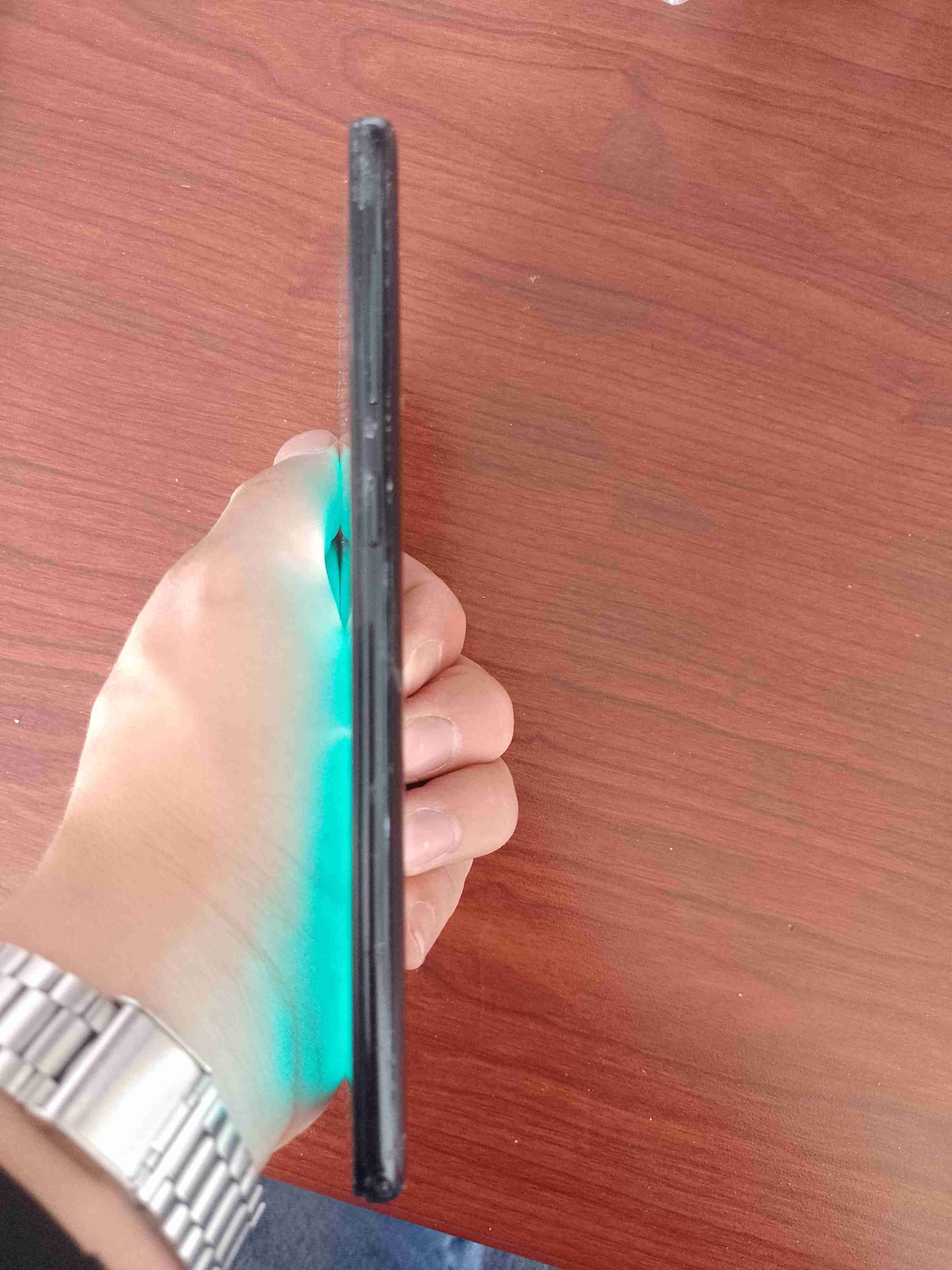 Teléfono celular con pantalla rota - miniatura 6