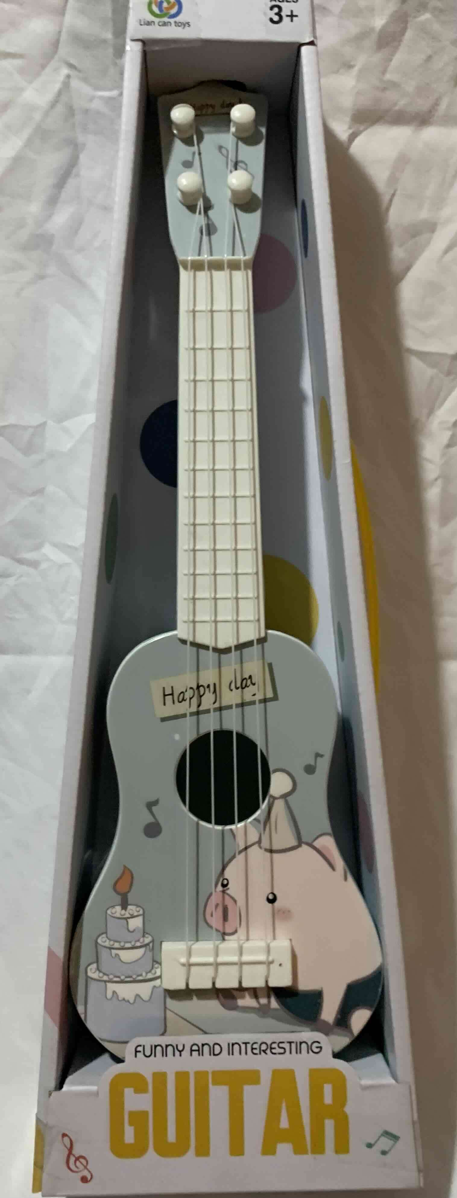 Guitarra infantil juguete - miniatura 2
