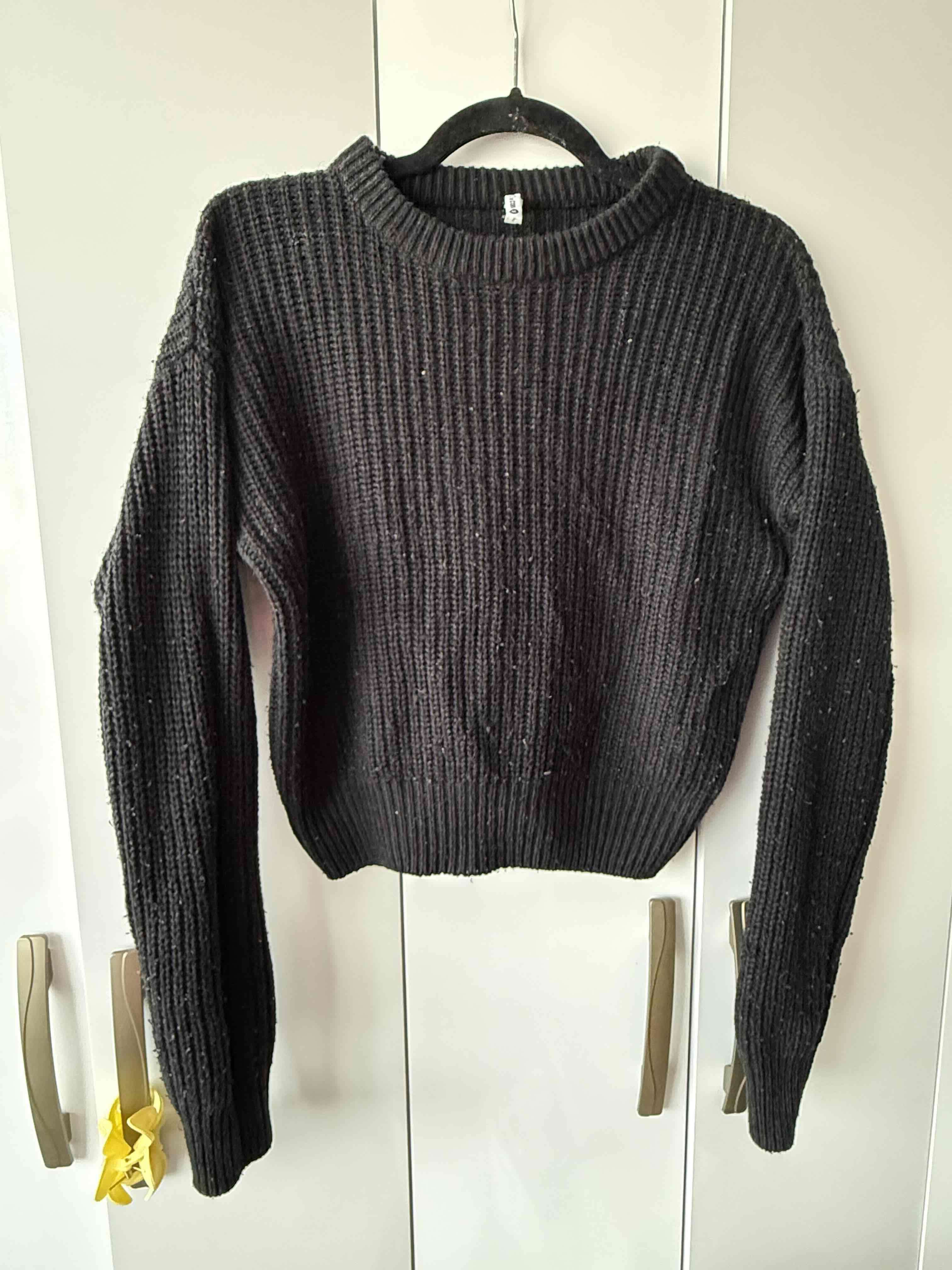 Suéter negro de lana