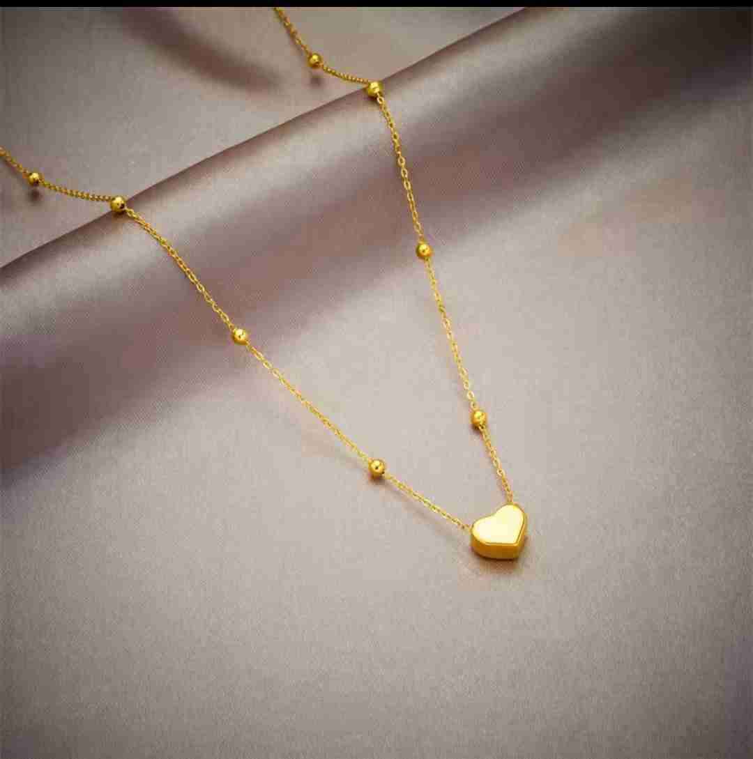 Collar dorado con dije de corazón - miniatura 2