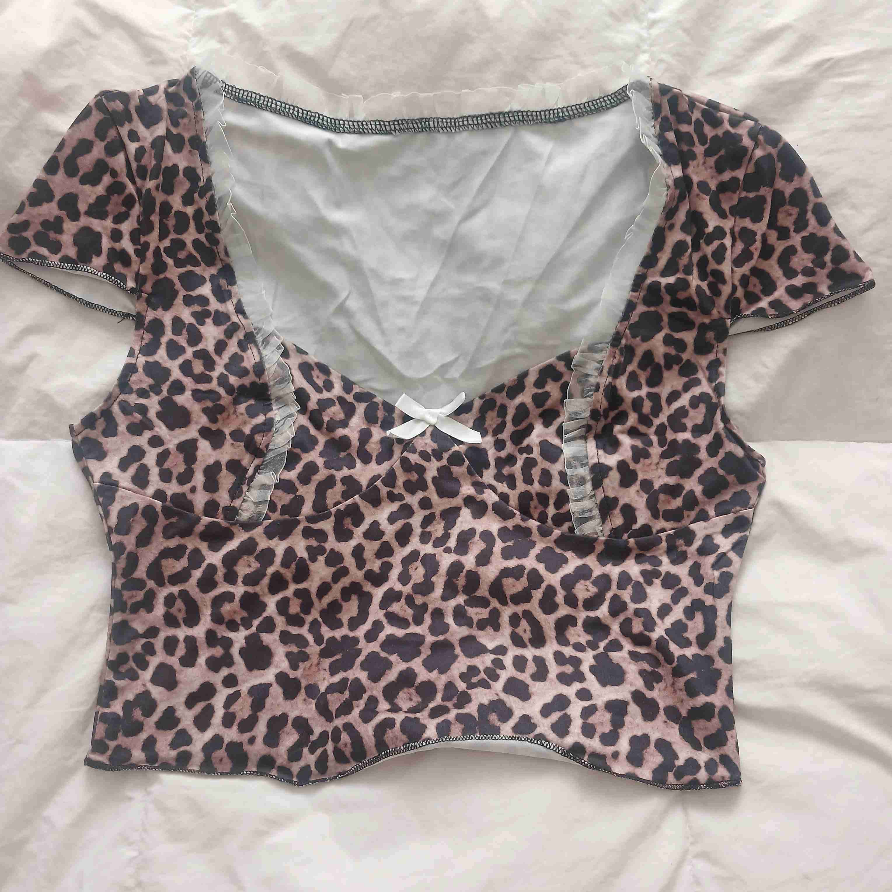 Top estampado animal print