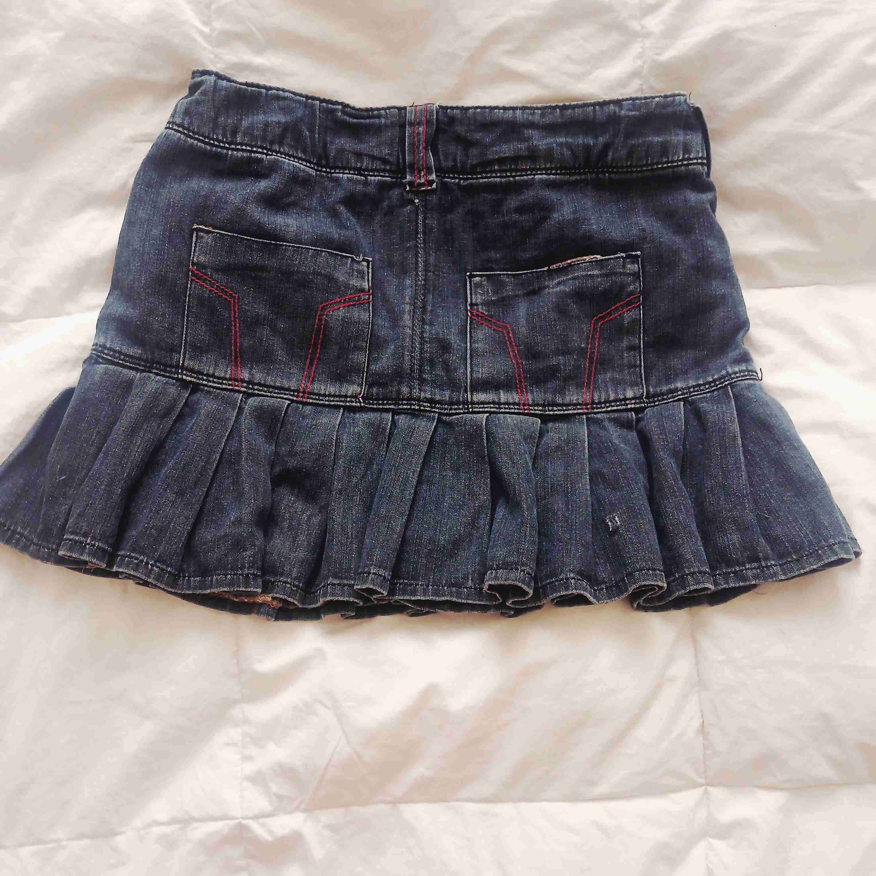 Falda de mezclilla azul con volantes - miniatura 2