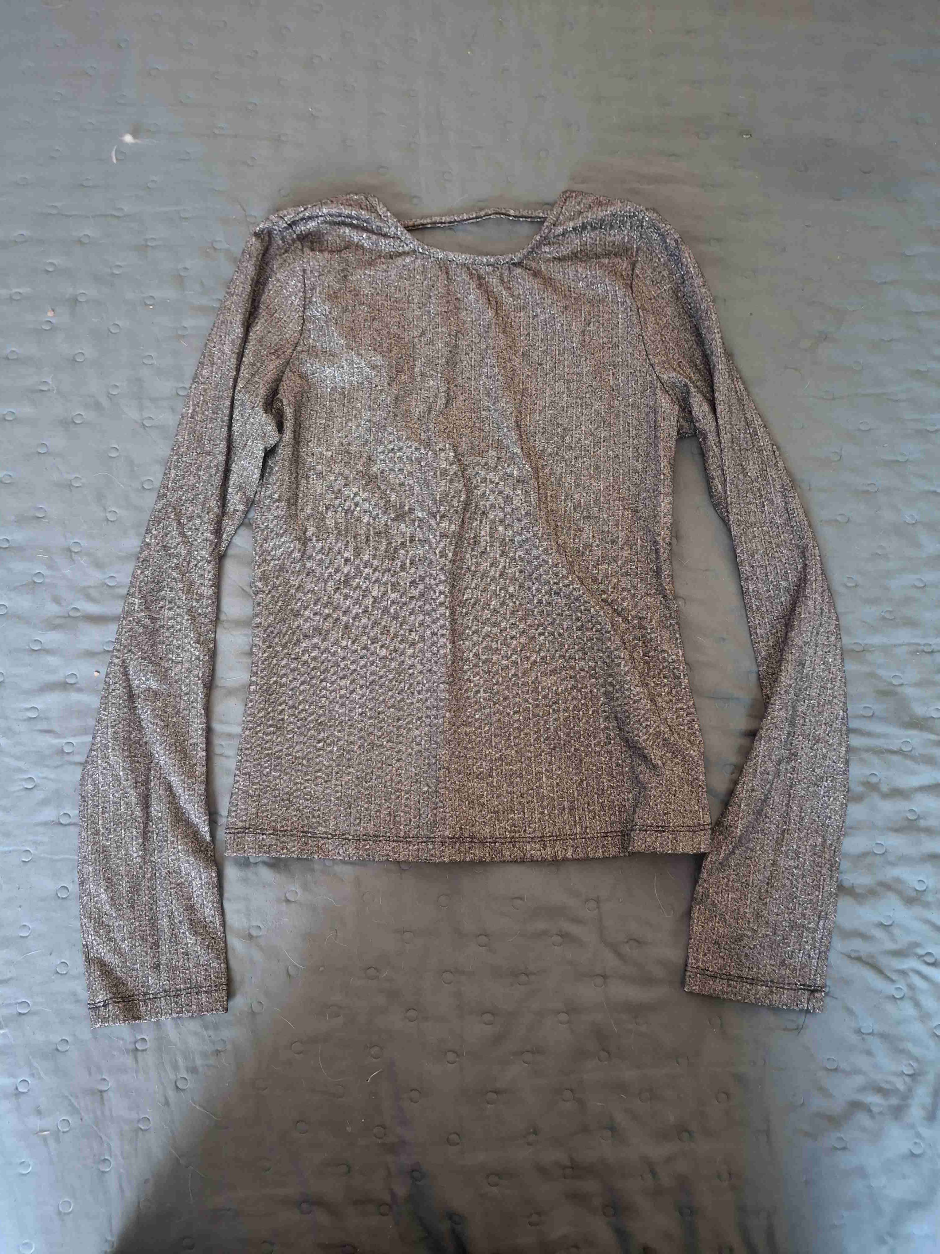 Polera brillos manga larga