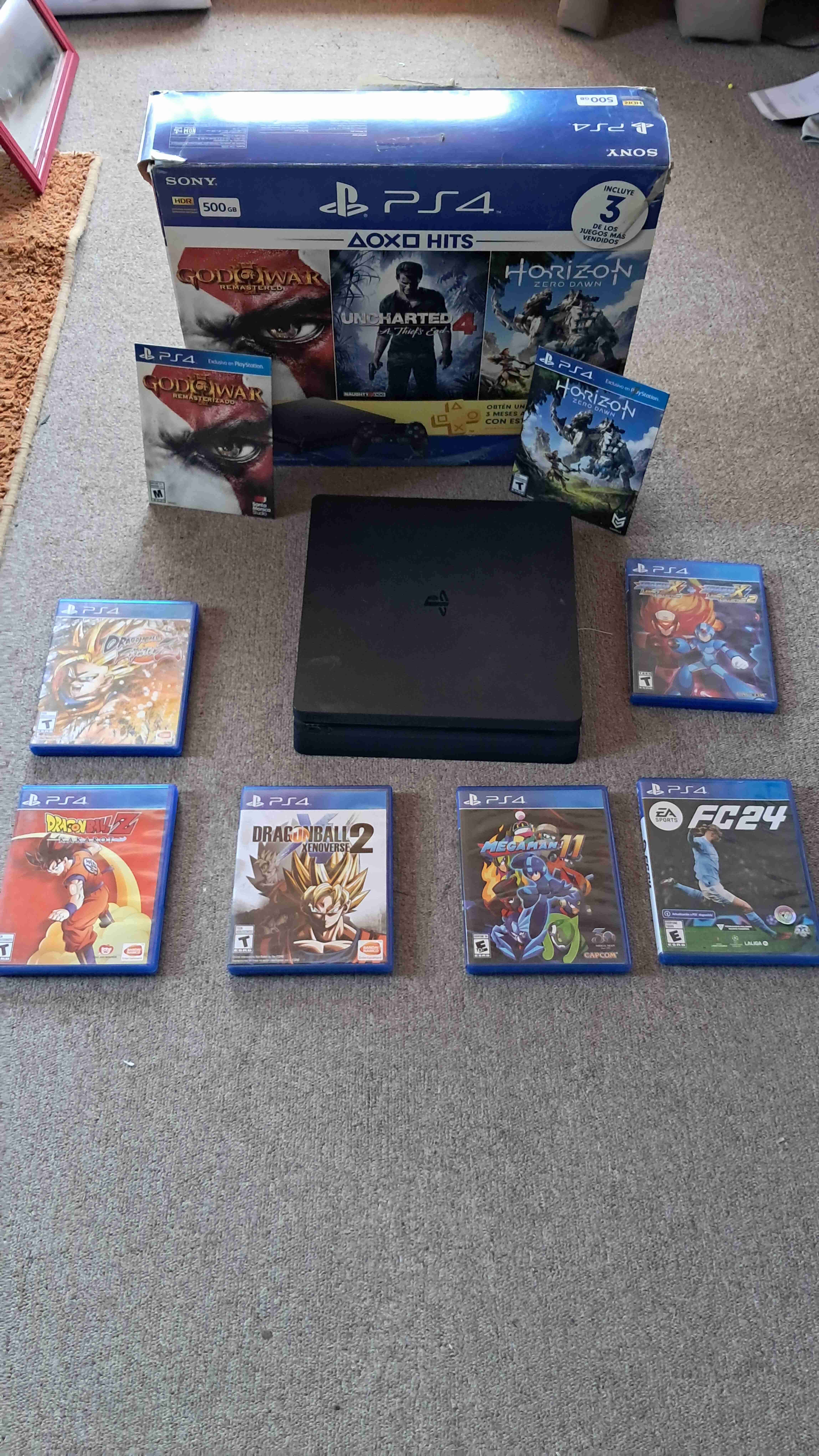 Consola PS4 con juegos juegos aparte