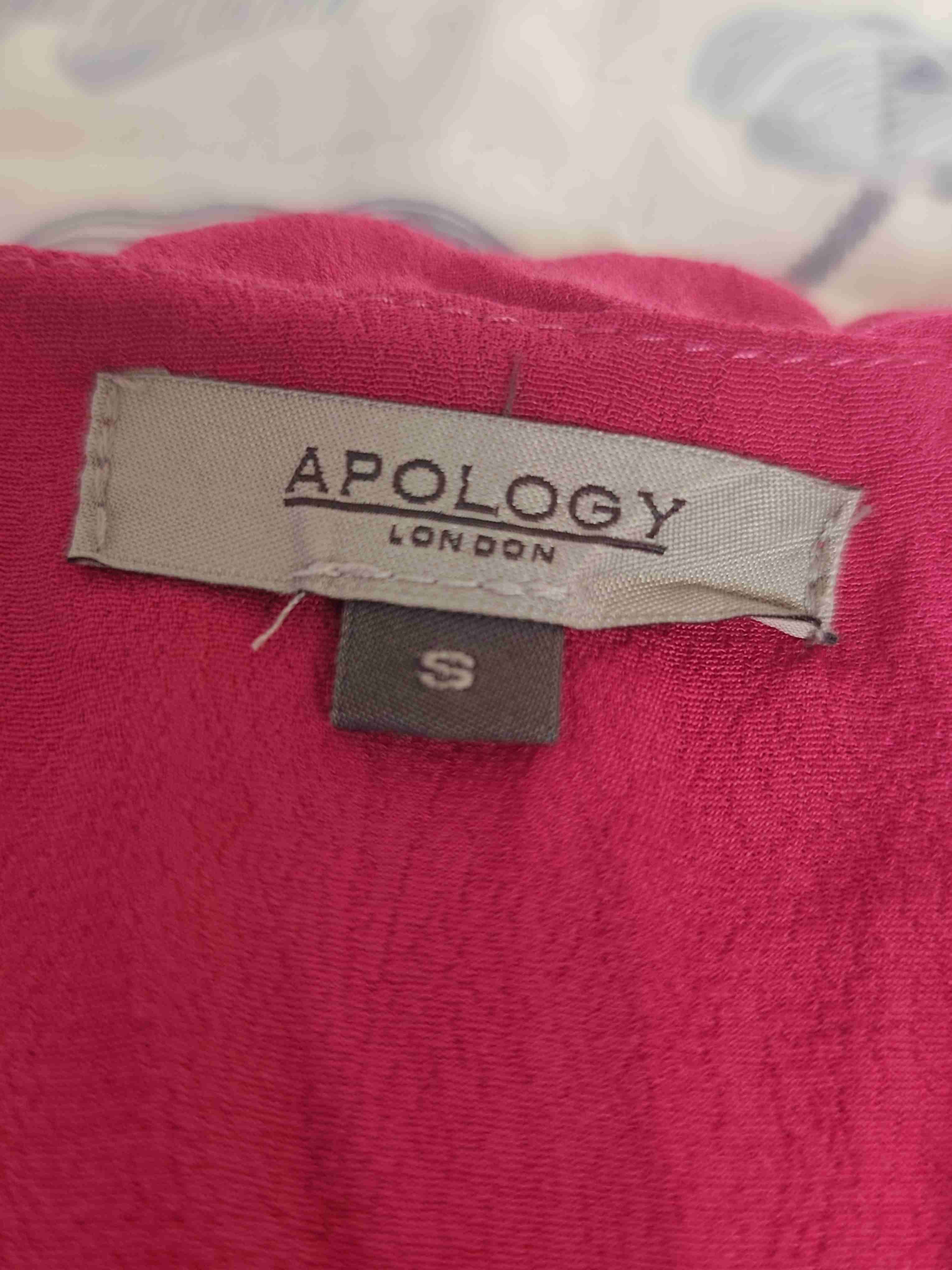 Blusa fucsia sin mangas - miniatura 2