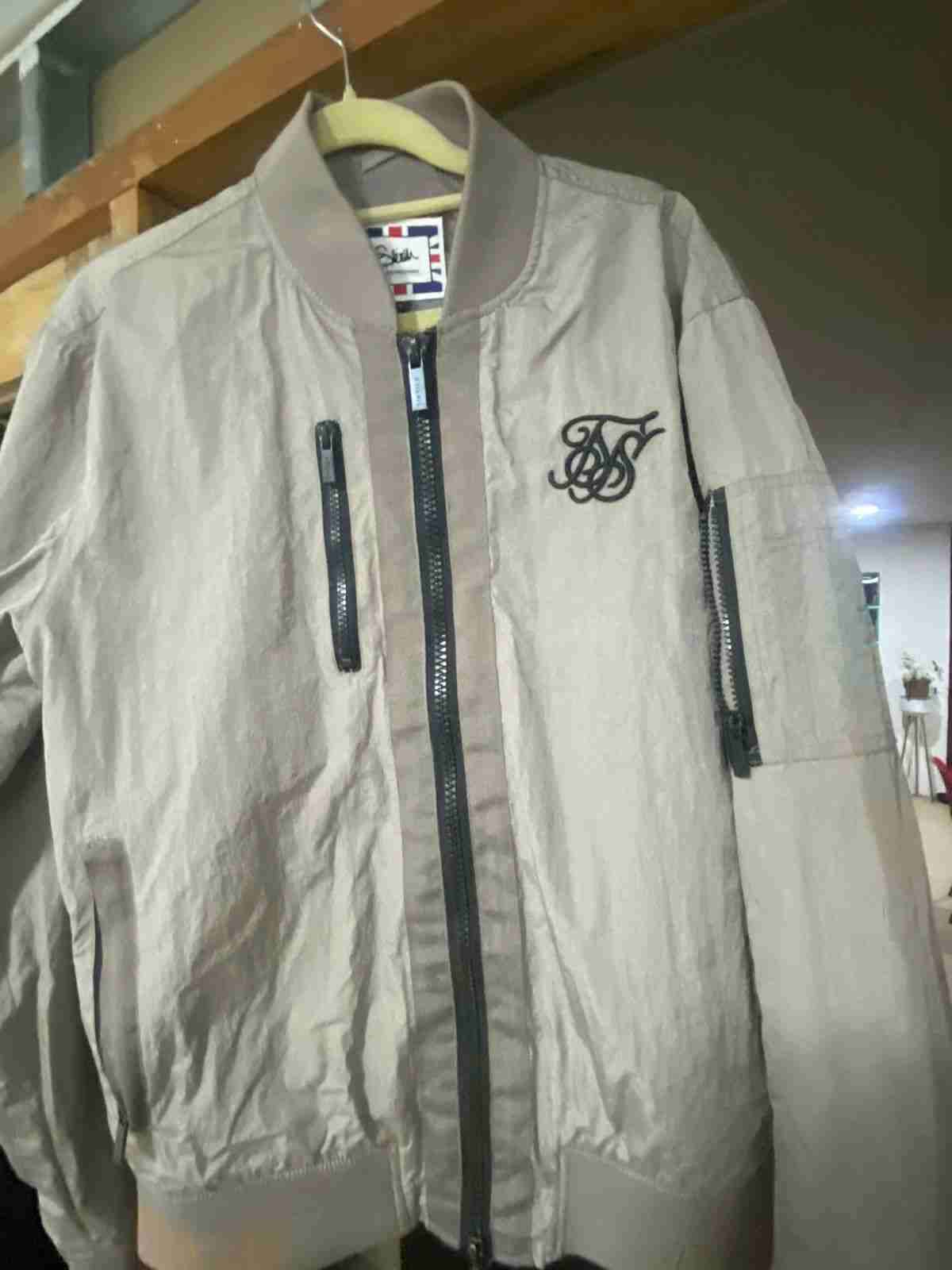 Chaqueta bomber beige