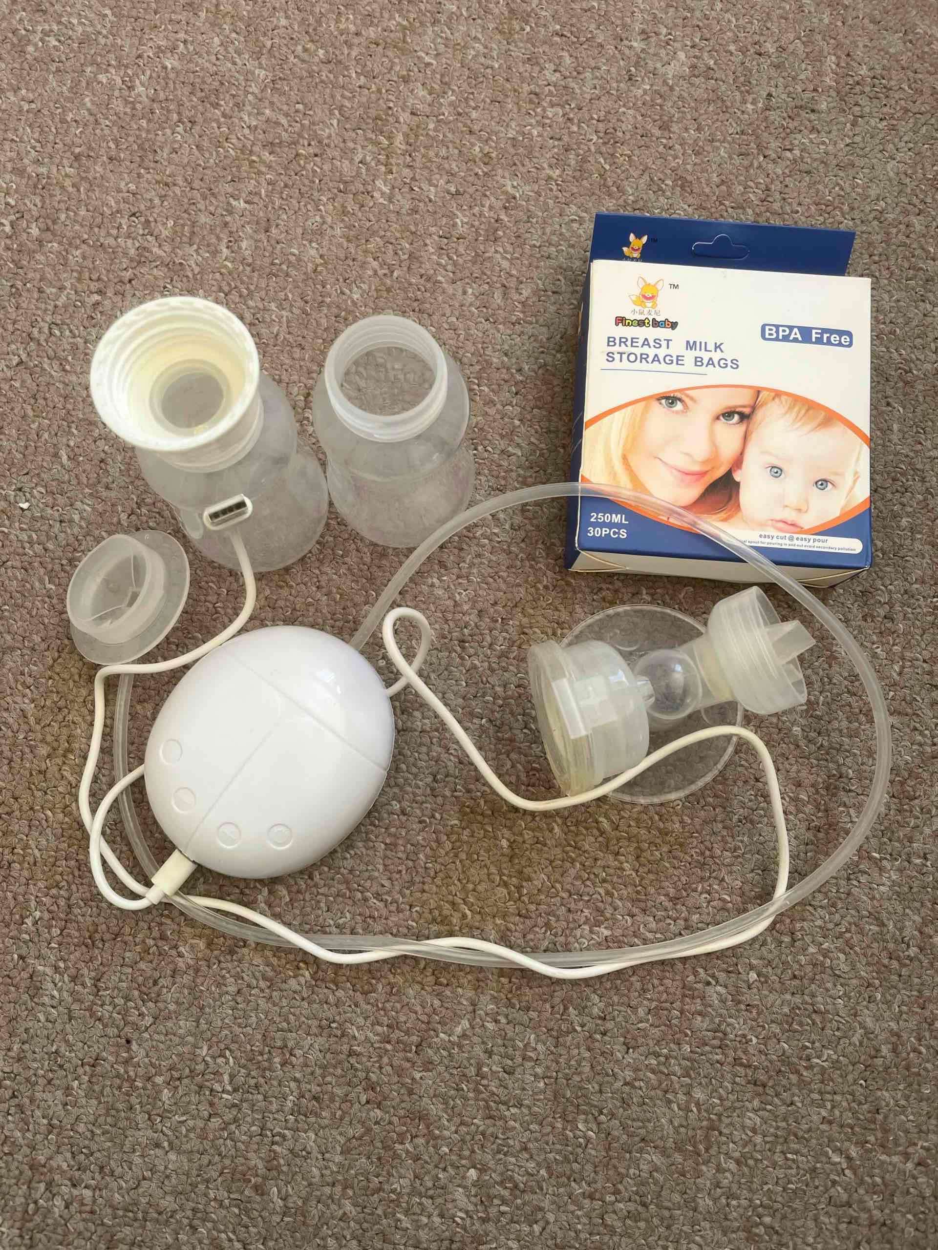 Extractor de leche eléctrico con botellas