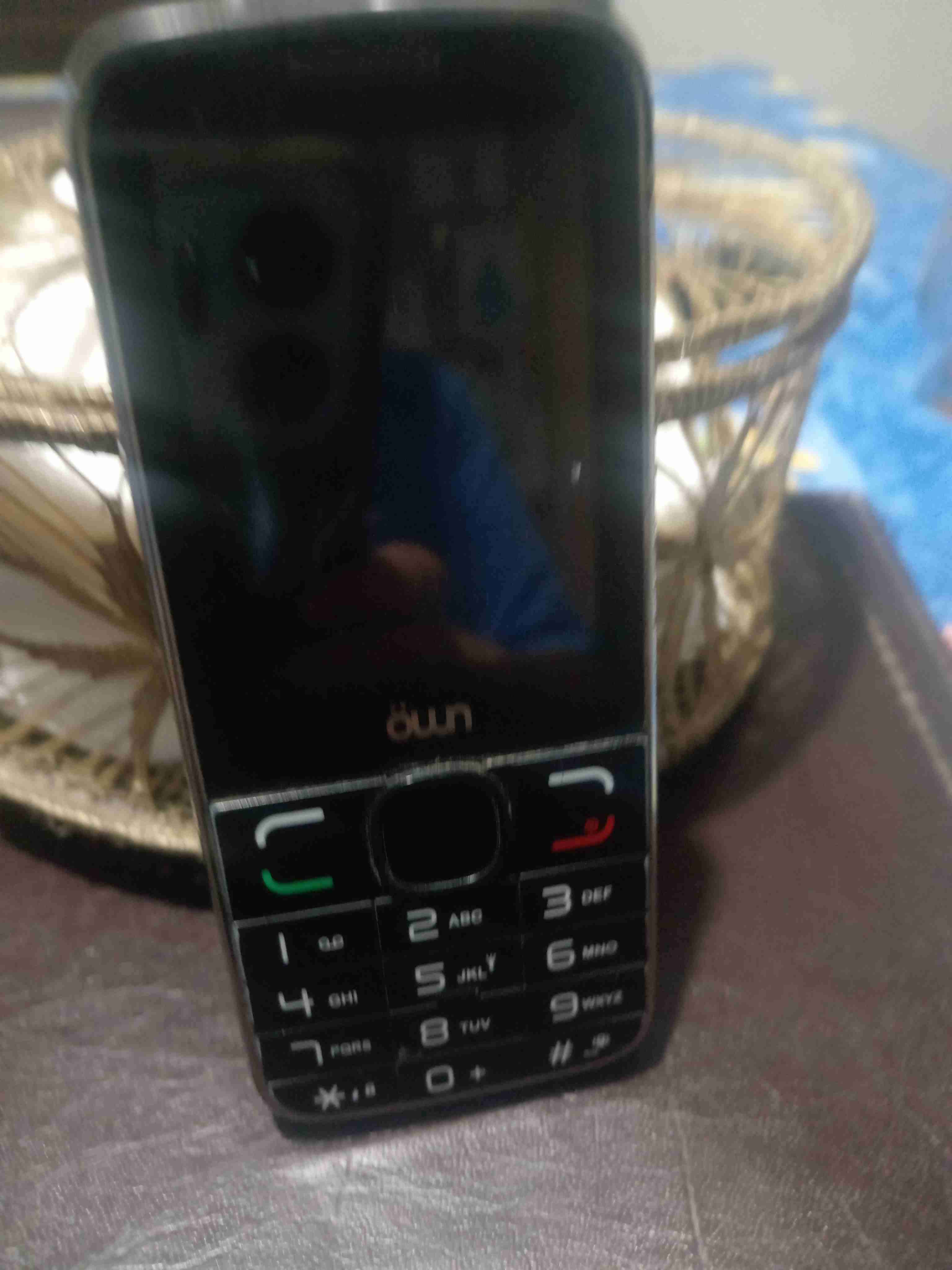 Teléfono celular básico Own