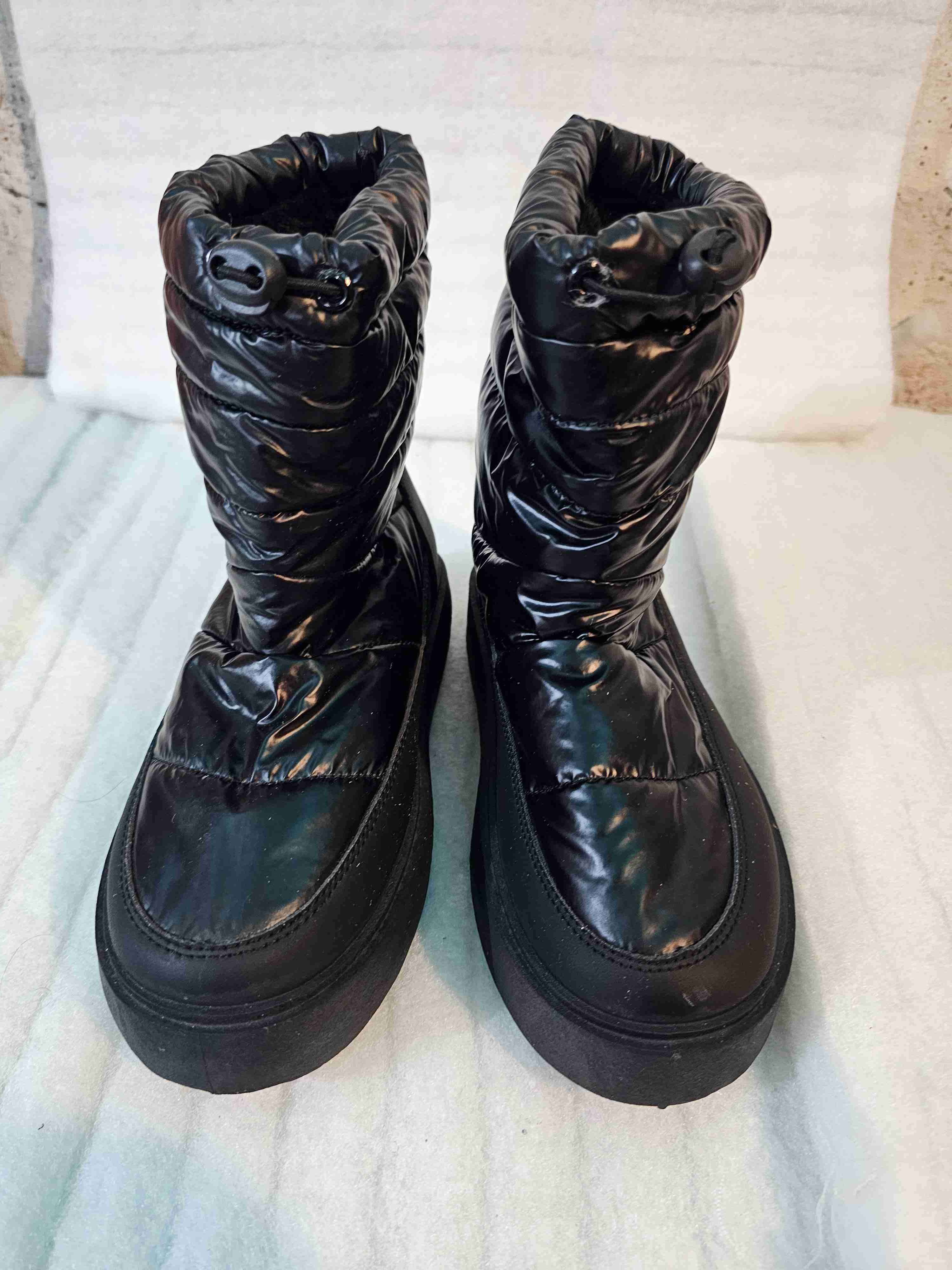 Botas acolchadas negras tricot