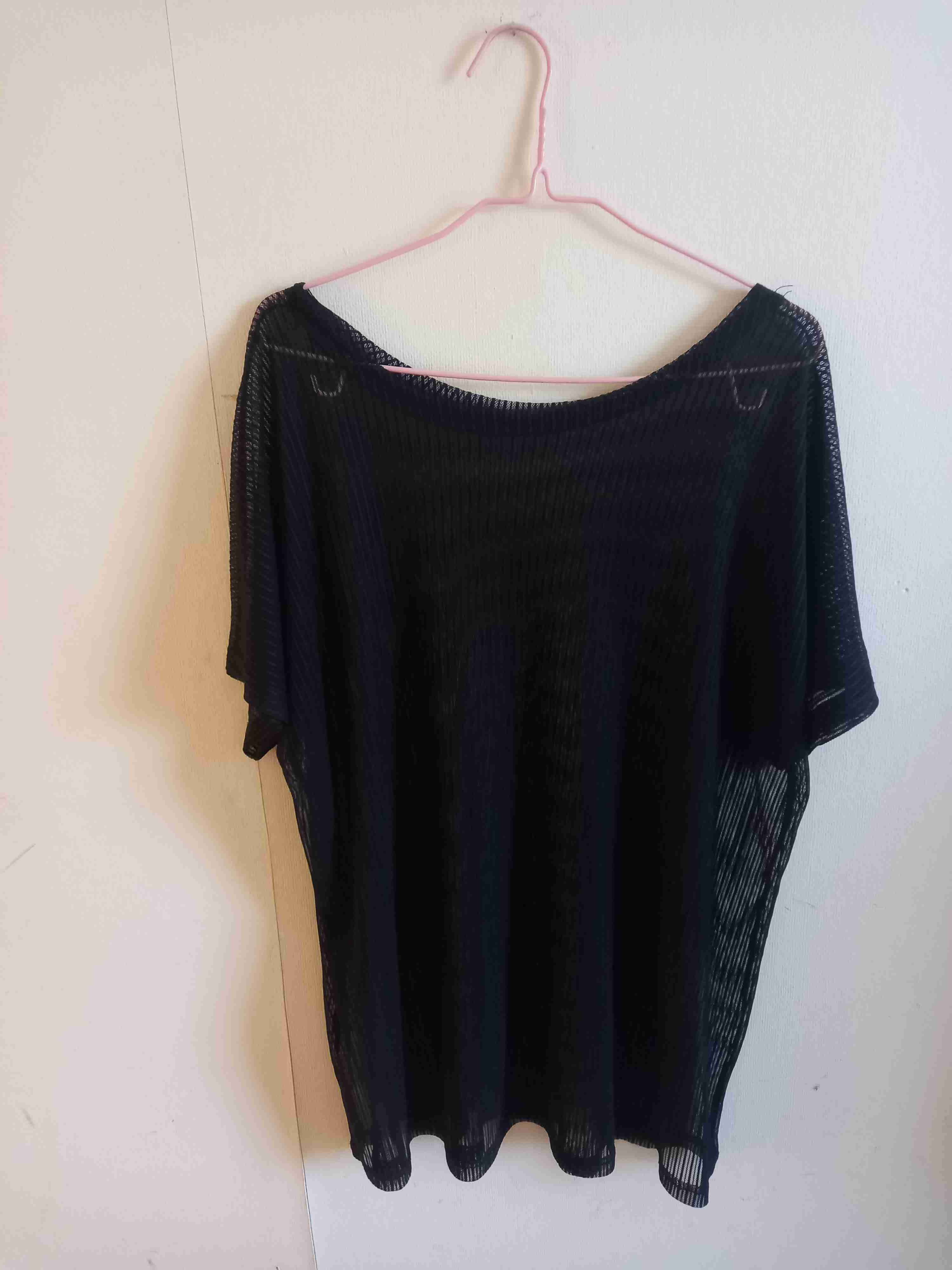 Polera negra transparente