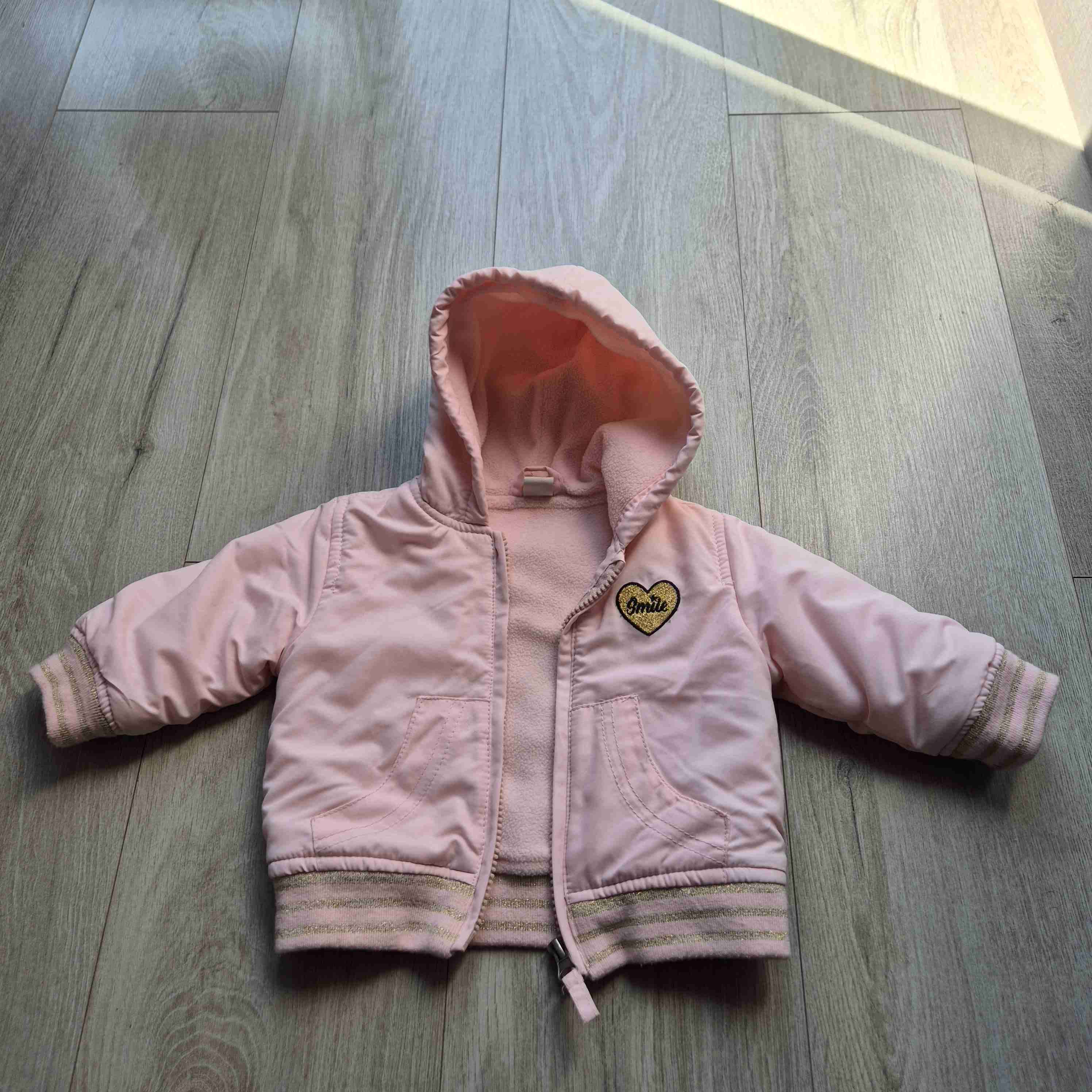 Chaqueta rosa para bebé